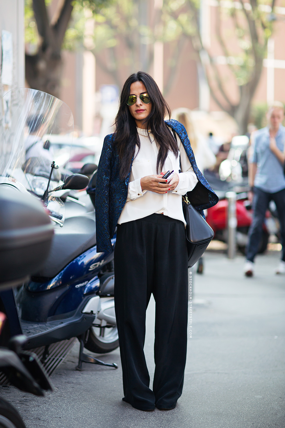 black wide leg pants and how to style them for fall by adding a