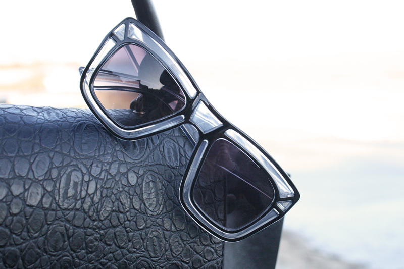 black outline sunglasses and celine bag