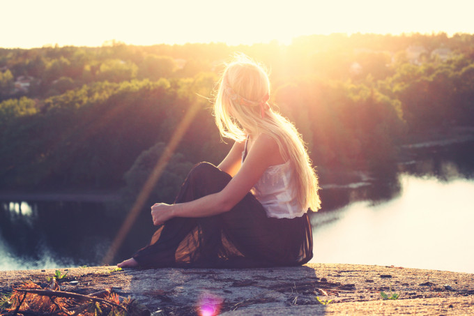 woman sitting on an edge and sharing Choosing a Name that Fits