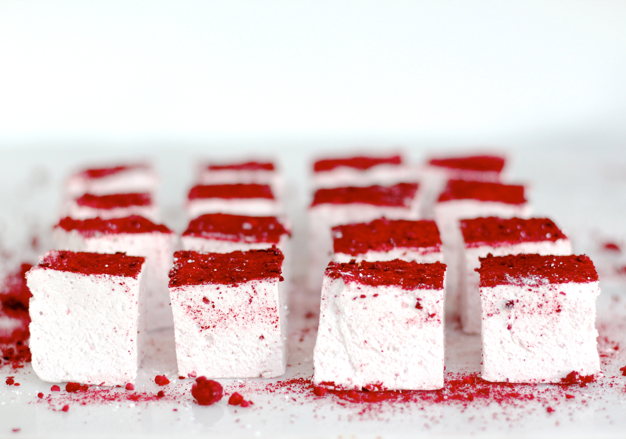 How to make fluffy homemade raspberry marshmallows (perfect for Valentine's Day!) Click through for the recipe. | glitterinc.com | @glitterinc