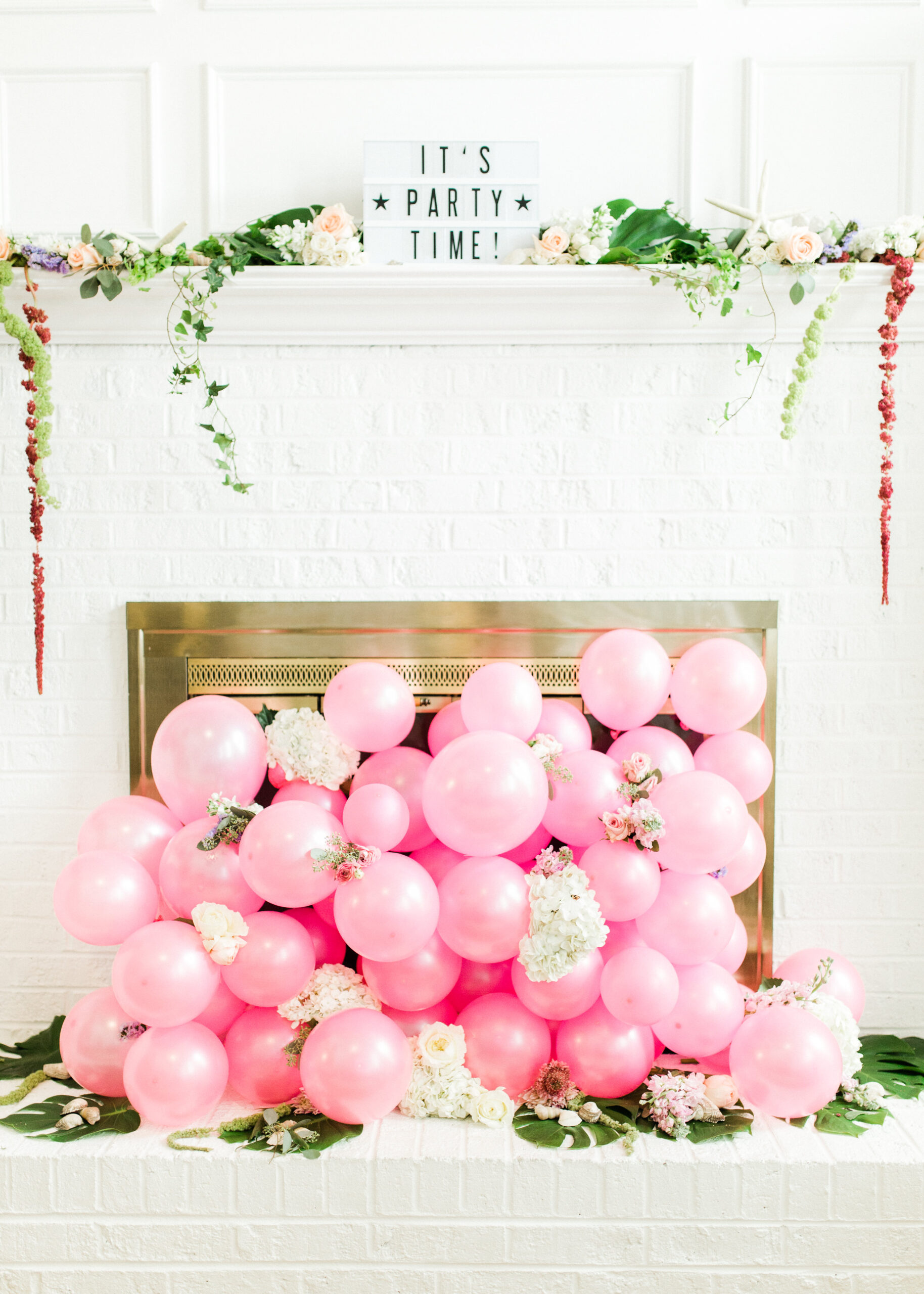 12 Inexpensive Valentine's Day Date Night Ideas - Fill Your Living Room with Balloons