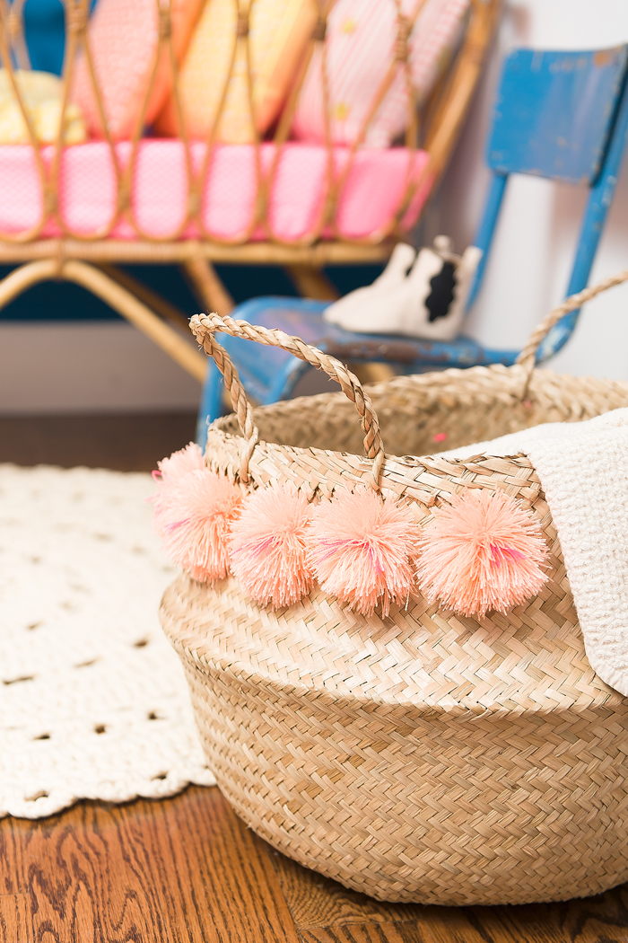 15 Favorite French Market Baskets, like this Pom Pom Basket in a Colorful Flamingo Nursery