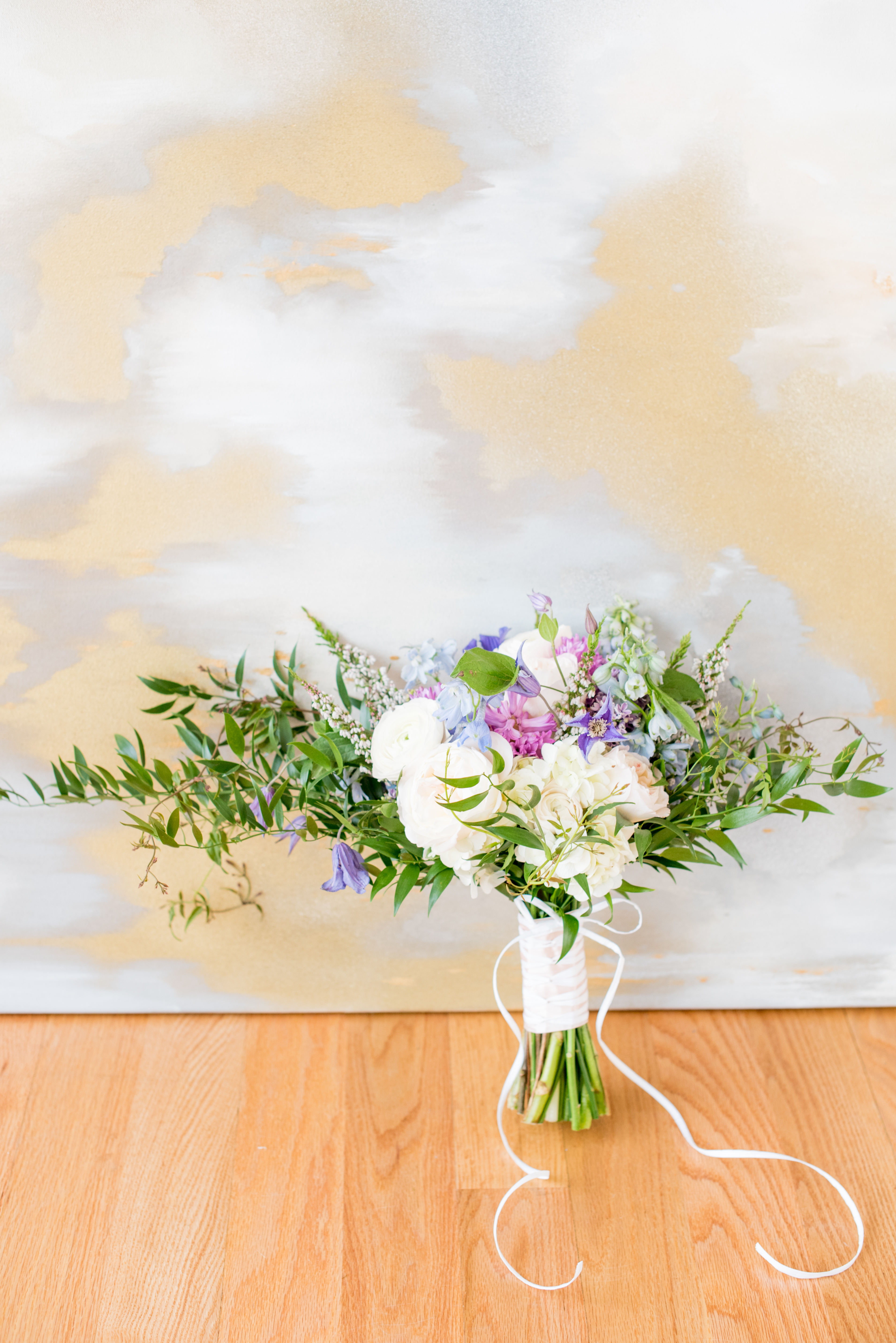 Behind-the-Scenes of a DIY Paper-Crafted Styled Wedding Shoot in The Year's Pantone Colors, Serenity and Rose Quartz, at the Glassbox in Downtown Raleigh North Carolina