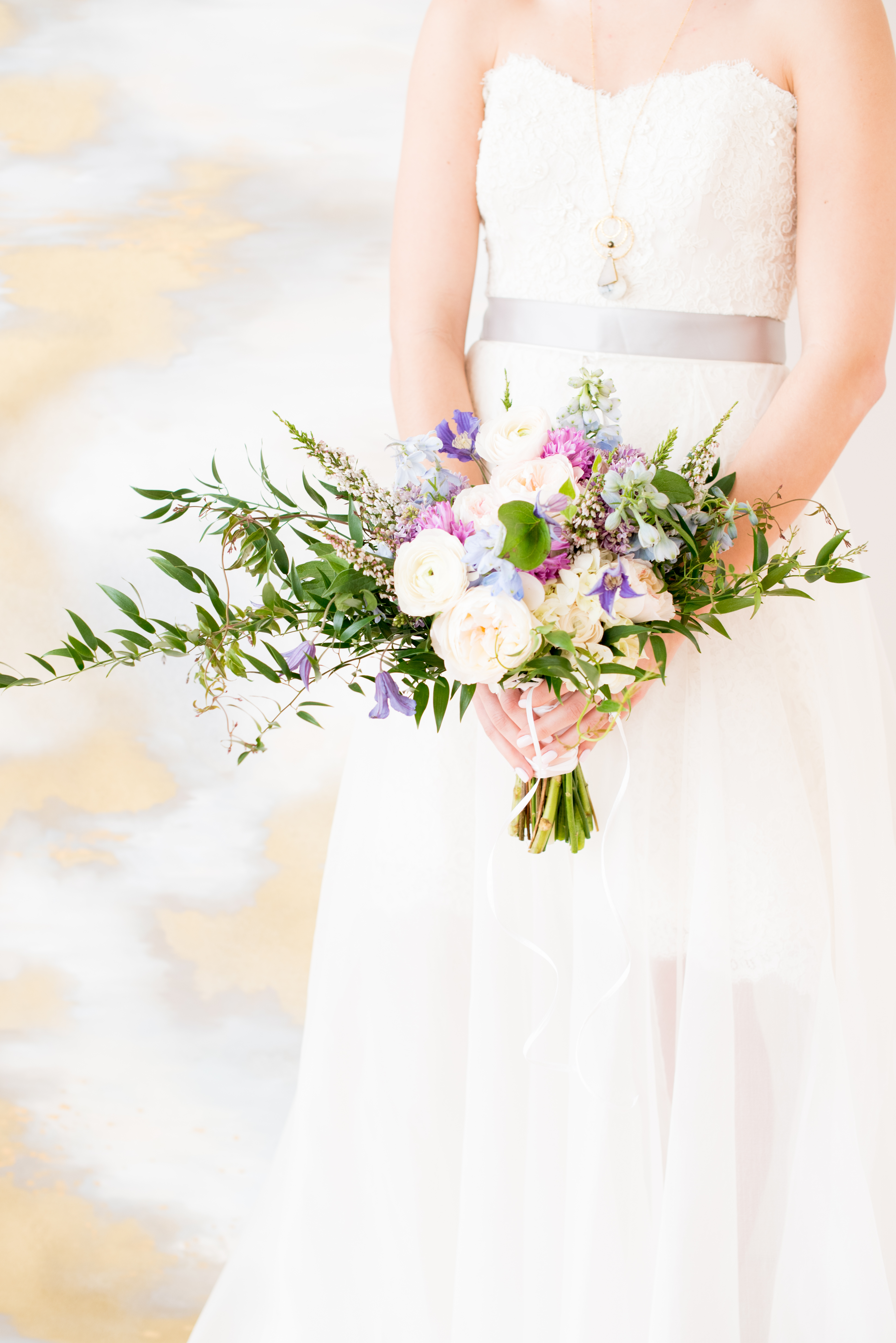 Behind-the-Scenes of a DIY Paper-Crafted Styled Wedding Shoot in The Year's Pantone Colors, Serenity and Rose Quartz, at the Glassbox in Downtown Raleigh North Carolina