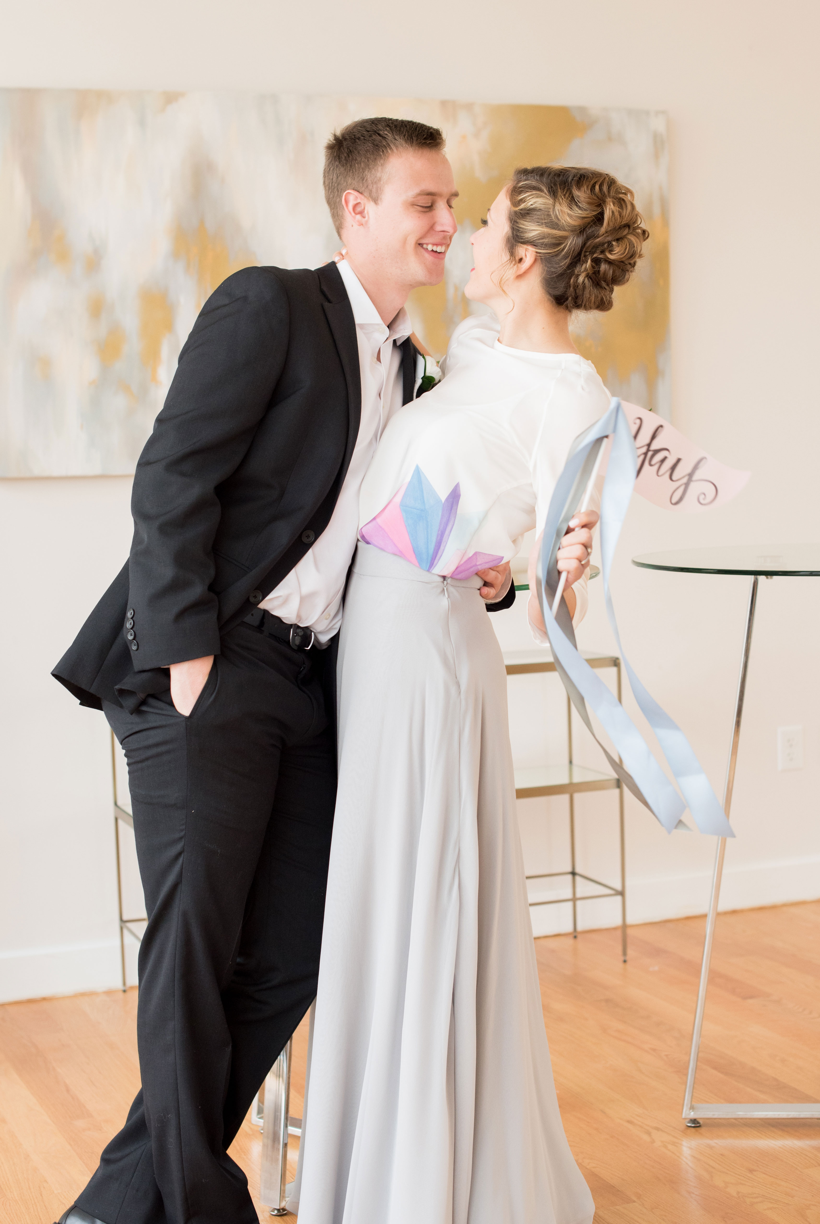 Behind-the-Scenes of a DIY Paper-Crafted Styled Wedding Shoot in The Year's Pantone Colors, Serenity and Rose Quartz, at the Glassbox in Downtown Raleigh North Carolina