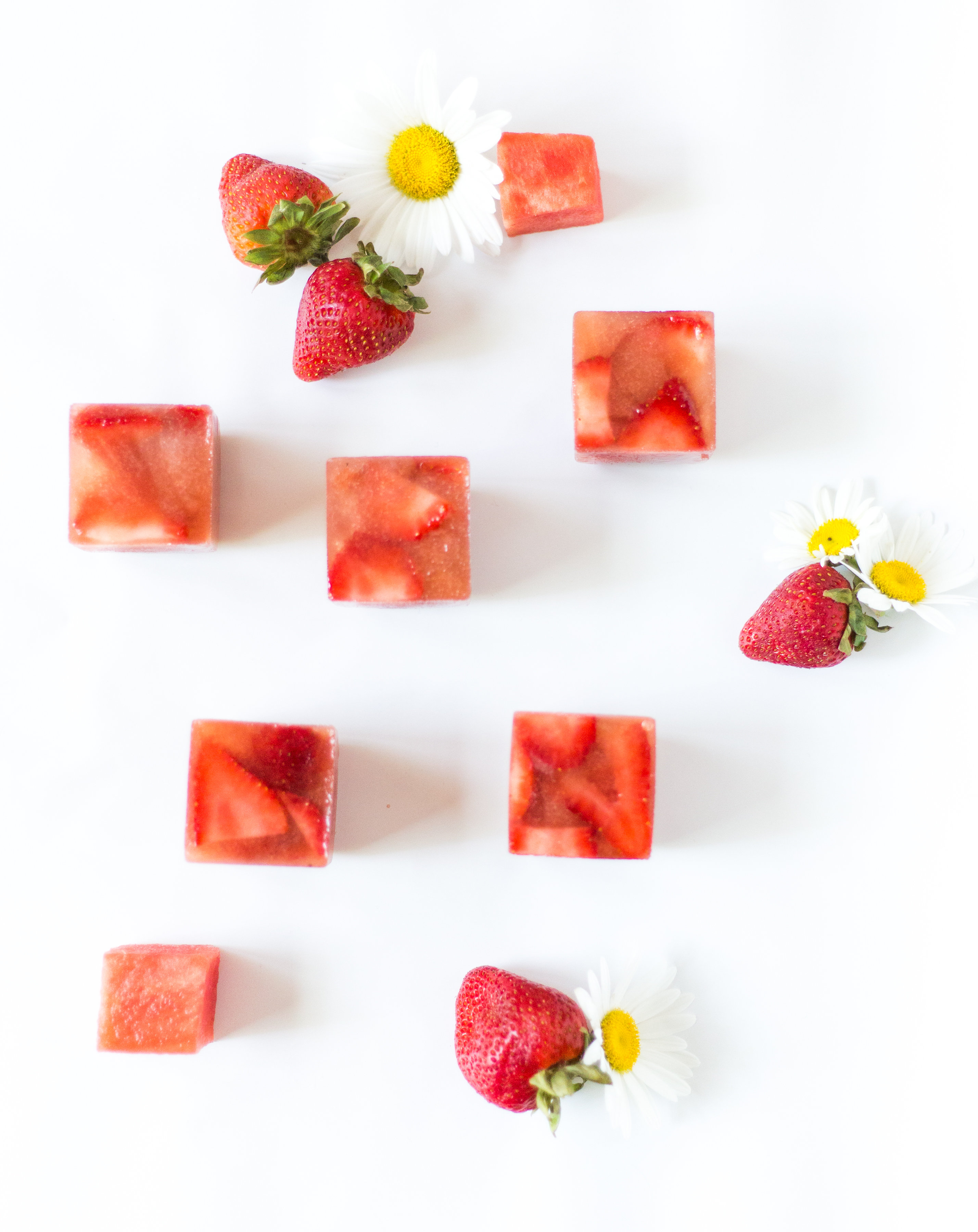 Say hello to your new favorite summer spritzer, made with prosecco and the yummiest giant strawberry watermelon ice cubes.