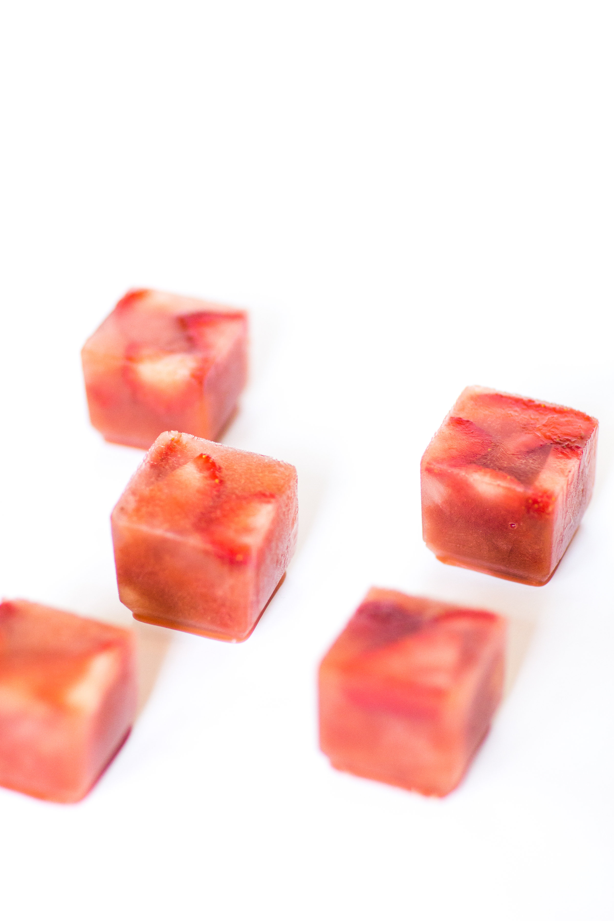 Say hello to your new favorite summer spritzer, made with prosecco and the yummiest giant strawberry watermelon ice cubes.