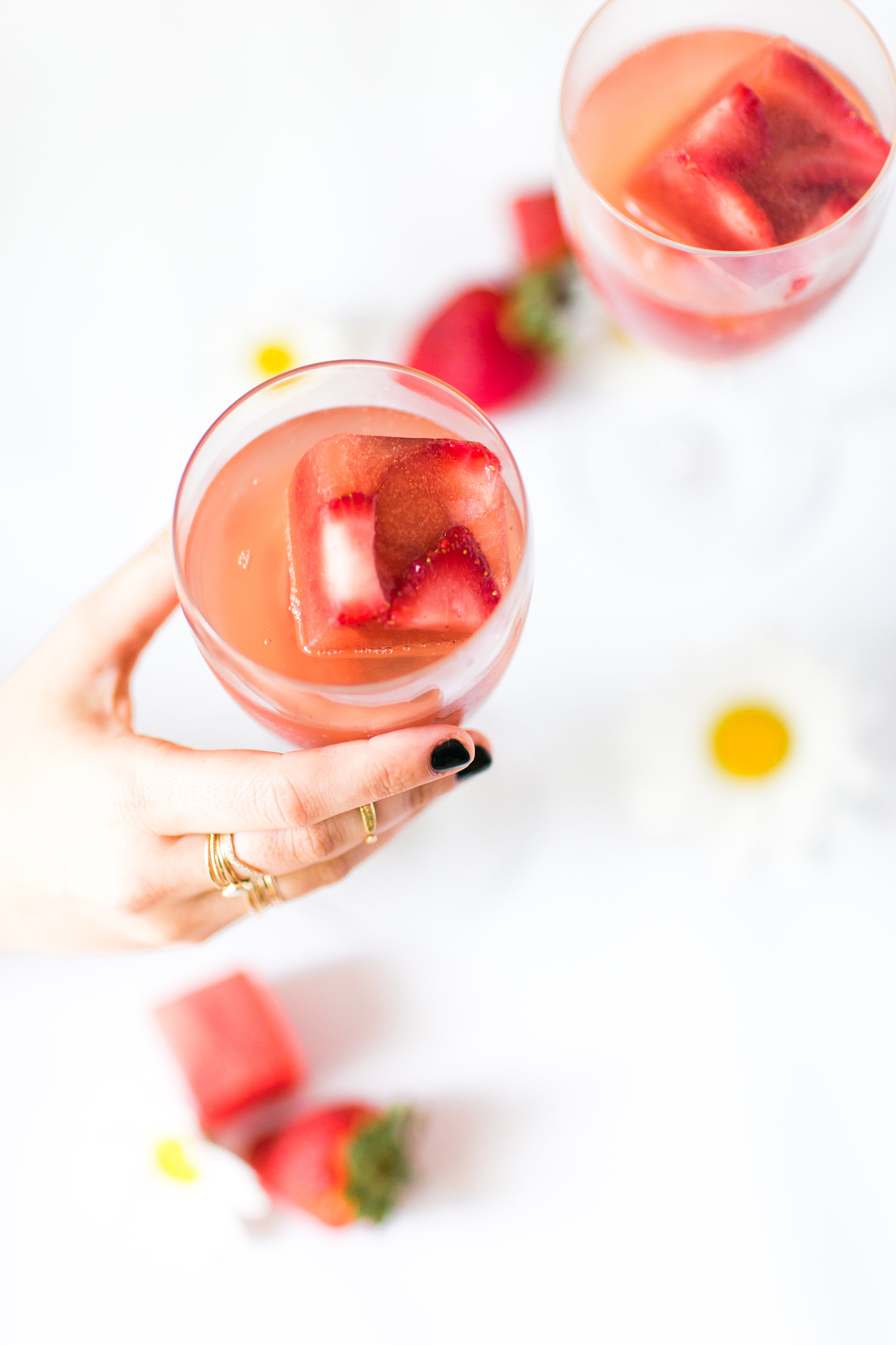 Say hello to your new favorite summer spritzer, made with prosecco and the yummiest giant strawberry watermelon ice cubes.