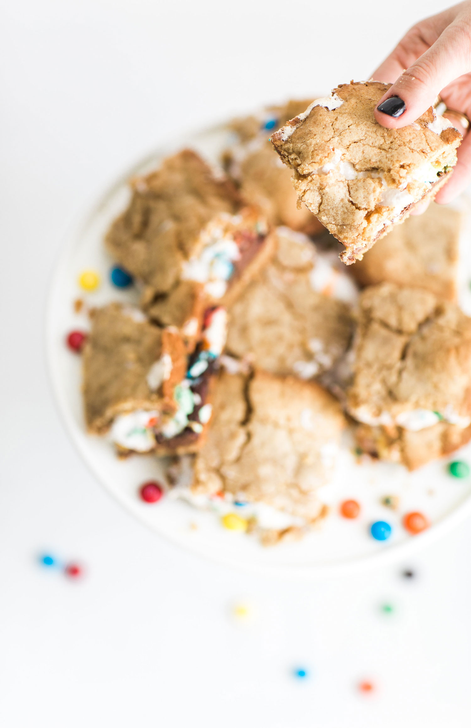 How to Make The Best Ever M&M S'Mores Cookie Bars (These s'mores bars are moist, perfectly sweet, and taste like your favorite campfire treat!)