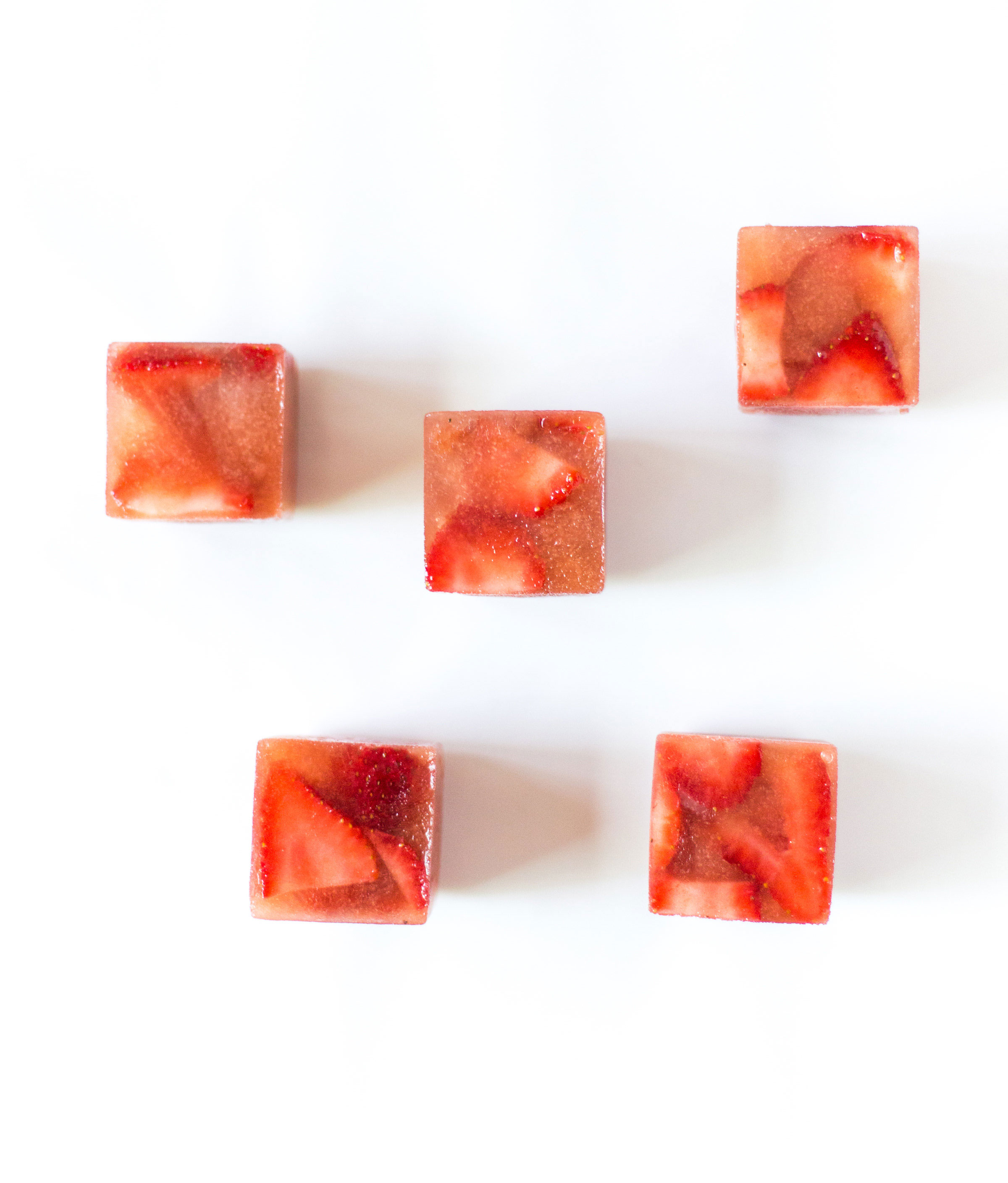 Say hello to your new favorite summer spritzer, made with prosecco and the yummiest giant strawberry watermelon ice cubes.