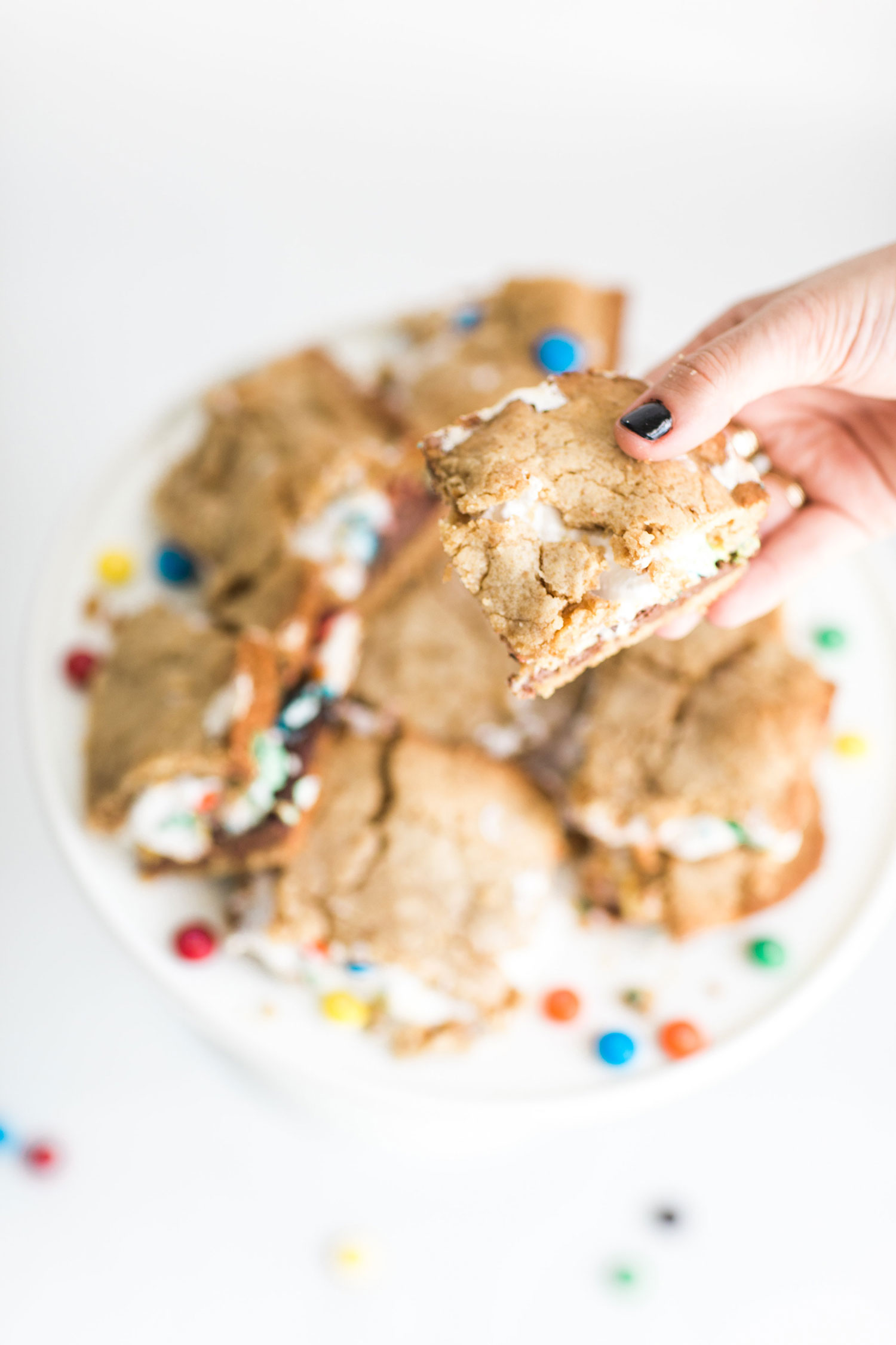 How to Make The Best Ever M&M S'Mores Cookie Bars (These s'mores bars are moist, perfectly sweet, and taste like your favorite campfire treat!)