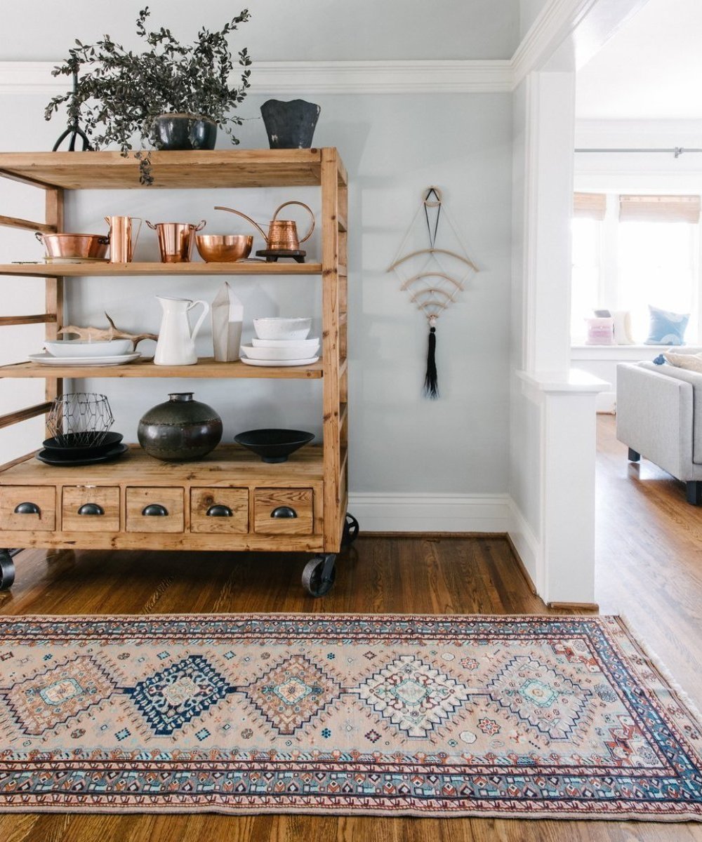 Your New Favorite Bohemian Home Décor Site: Loom + Kiln (Persian Caucasian Rug in a Bohemian Dining Room)