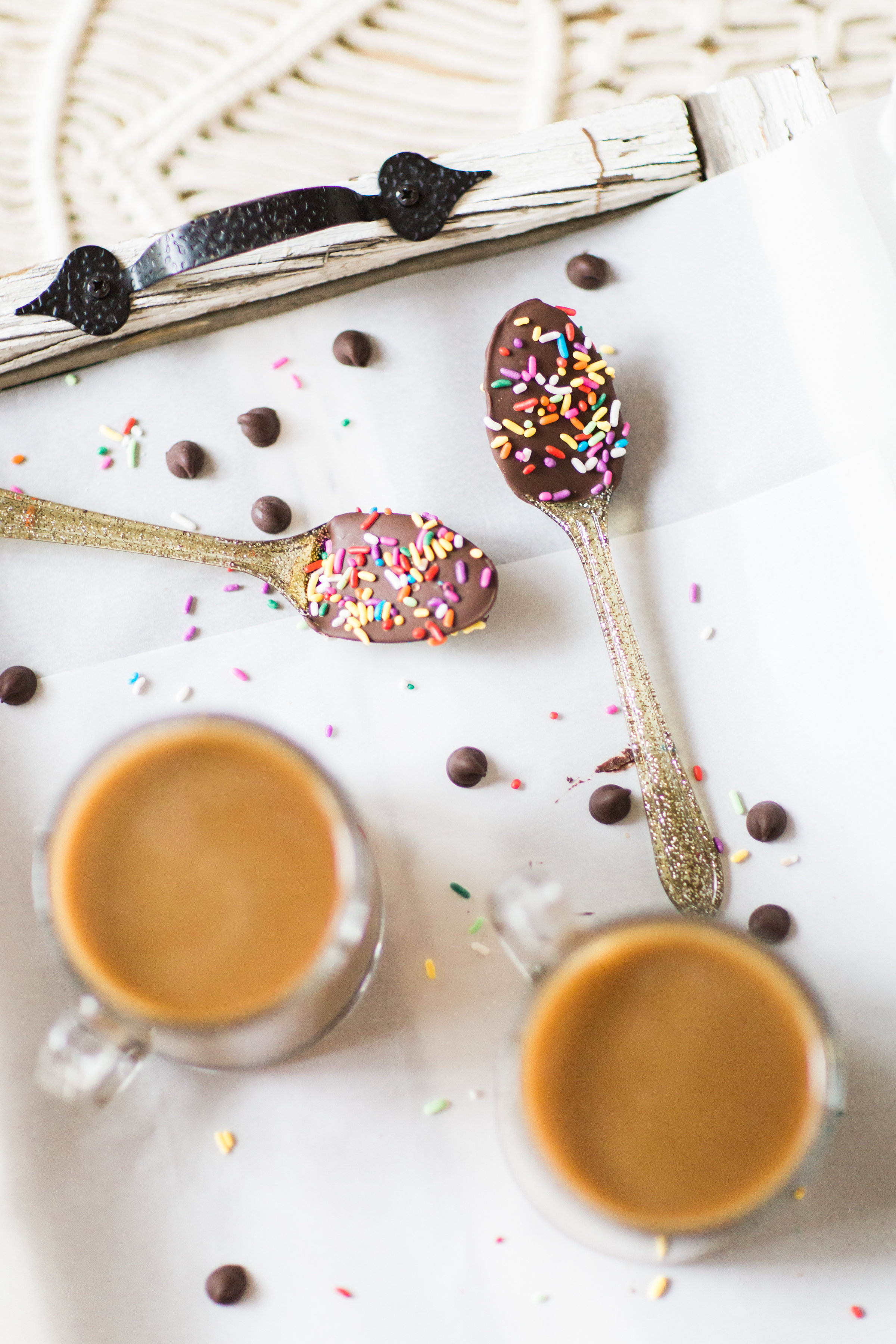 How to make an almond milk chocolate glazed donut coffee with chocolate-dipped sprinkle spoons. Click through for the details. | glitterinc.com | @glitterinc