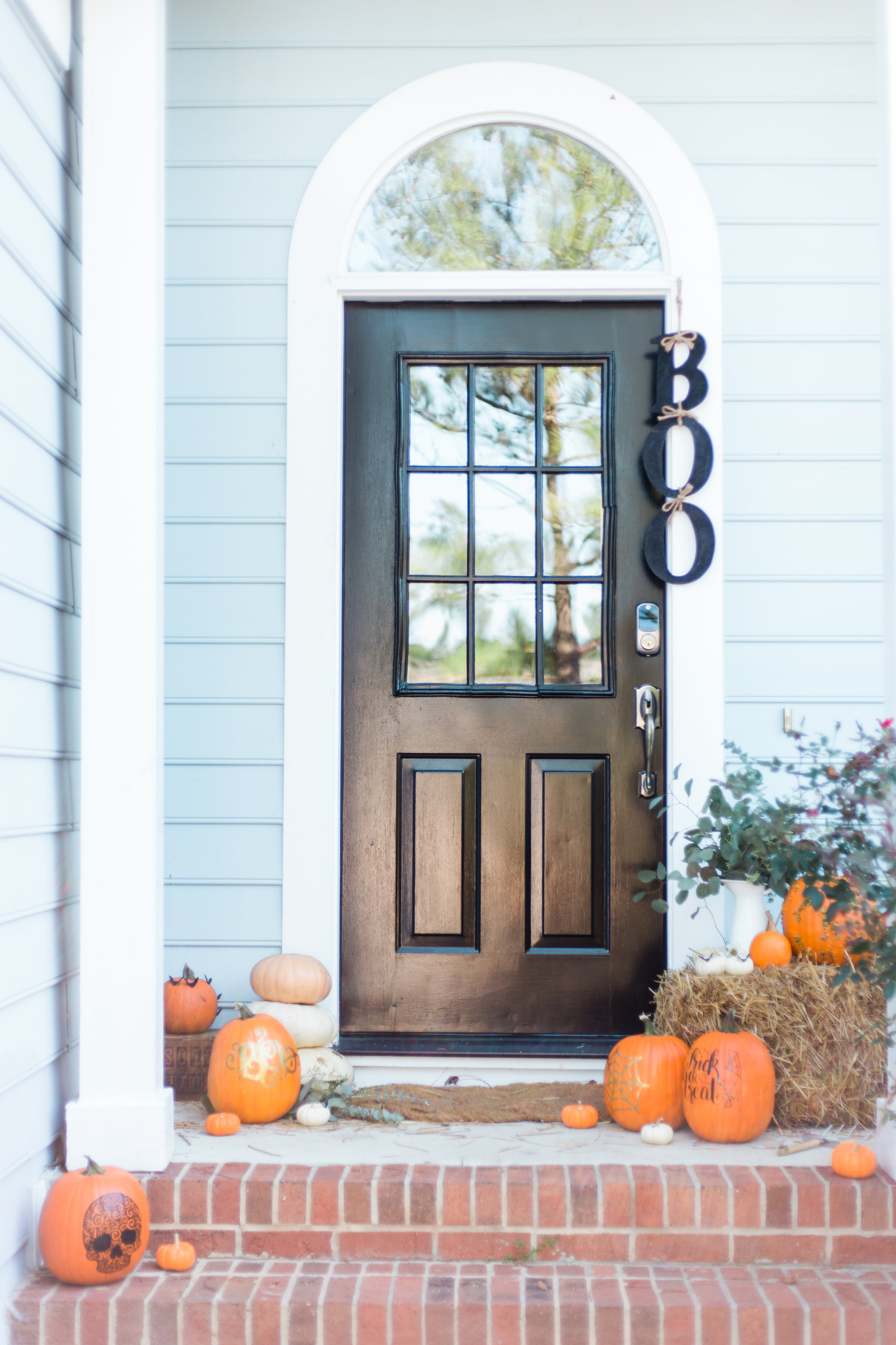 I'm revealing our Halloween Front Porch for Fall and details about how to decorate your own! Click through for the details. | glitterinc.com | @glitterinc