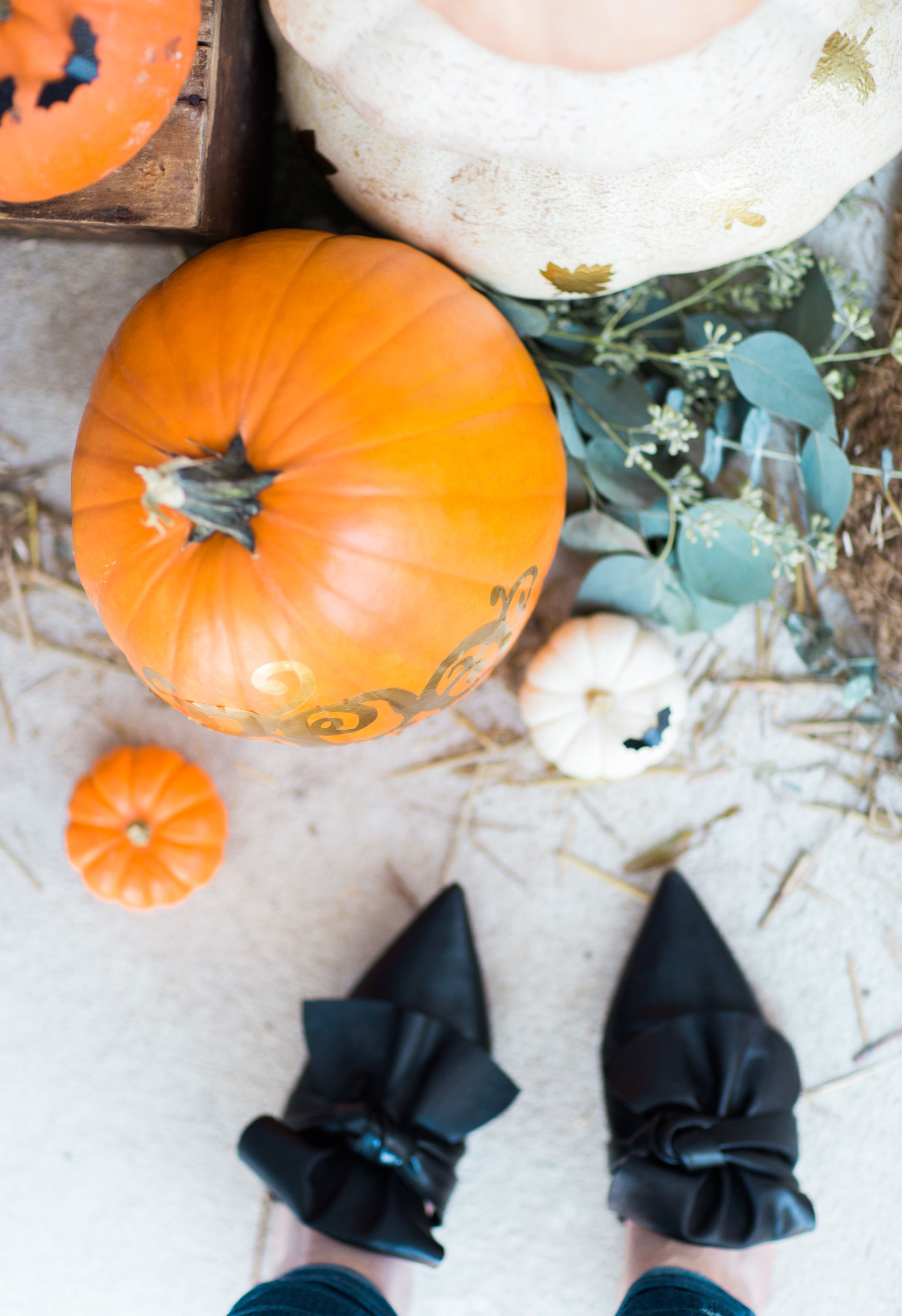 I'm revealing our Halloween Front Porch for Fall and details about how to decorate your own! Click through for the details. | glitterinc.com | @glitterinc