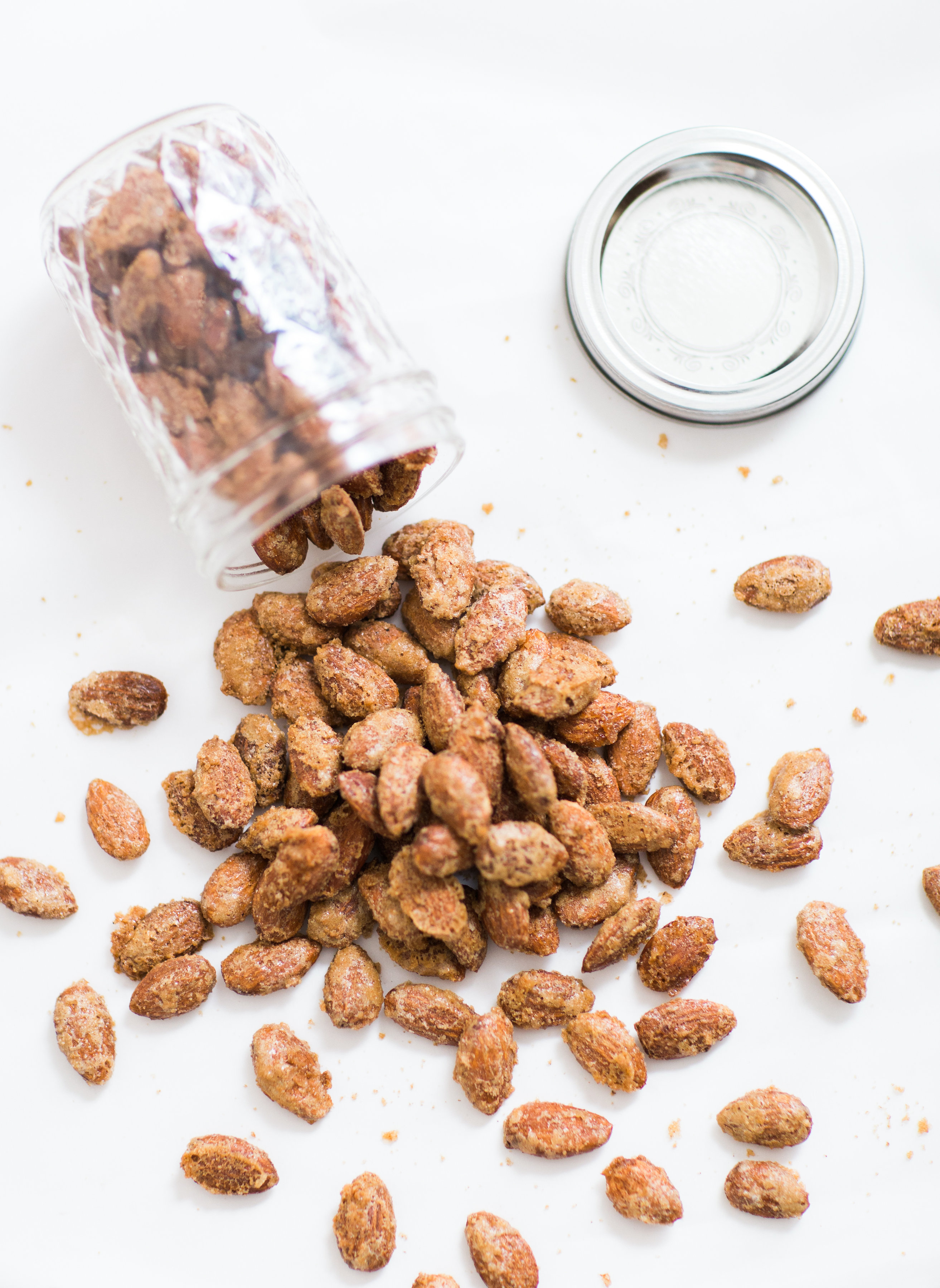 How to make candied cinnamon-roasted almonds. Click through for the simple and amazing recipe. #candiednuts #candiedalmonds #holidays #theholidays #holidaygifts #christmasgifts #cinnamonroastedalmonds #cinnamonroastednuts | glitterinc.com | @glitterinc
