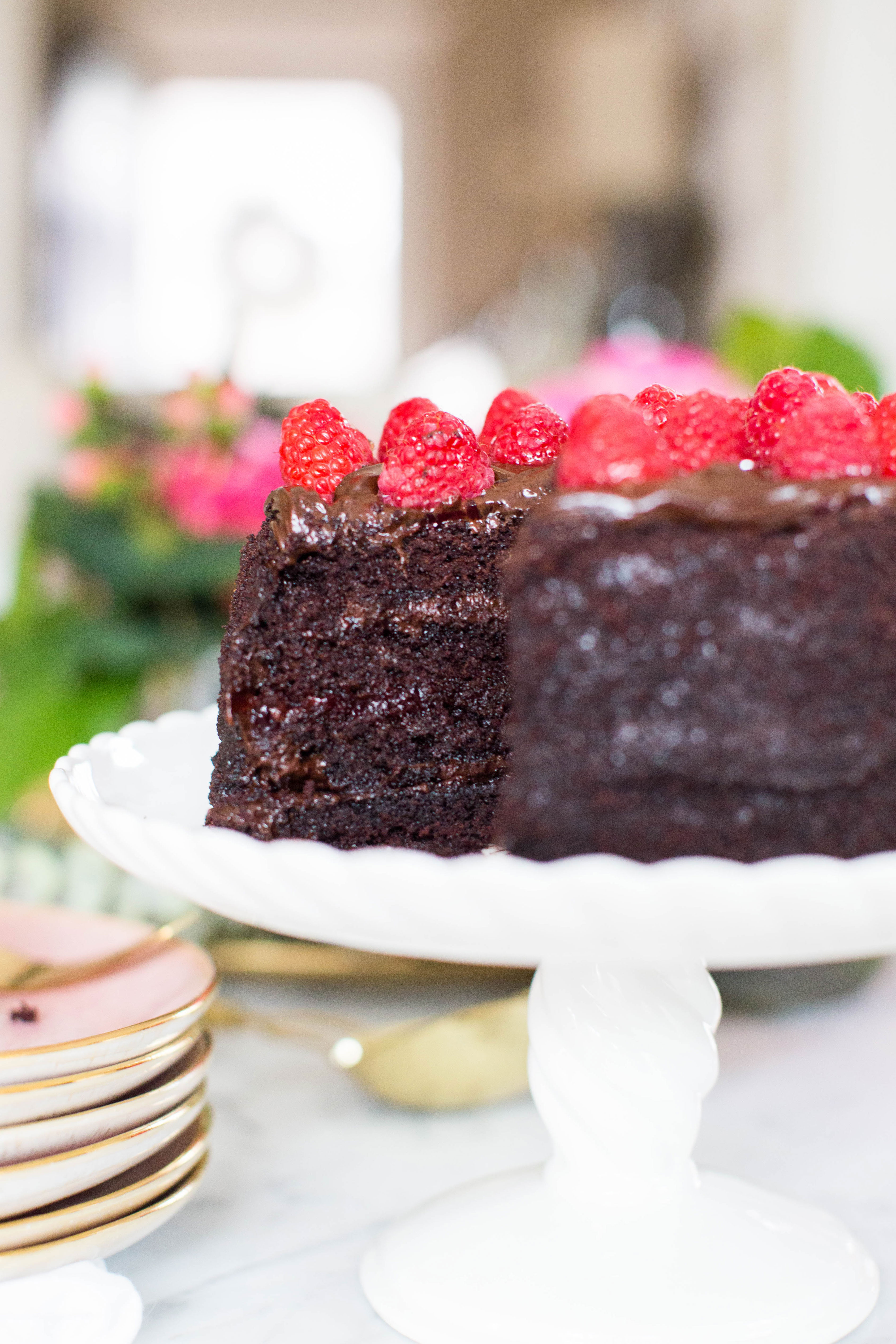 Chocolate raspberry cake at a Valentine's Day Inspired Dessert Party for Galentine's Day. Click through for all of the pretty details. | glitterinc.com | @glitterinc