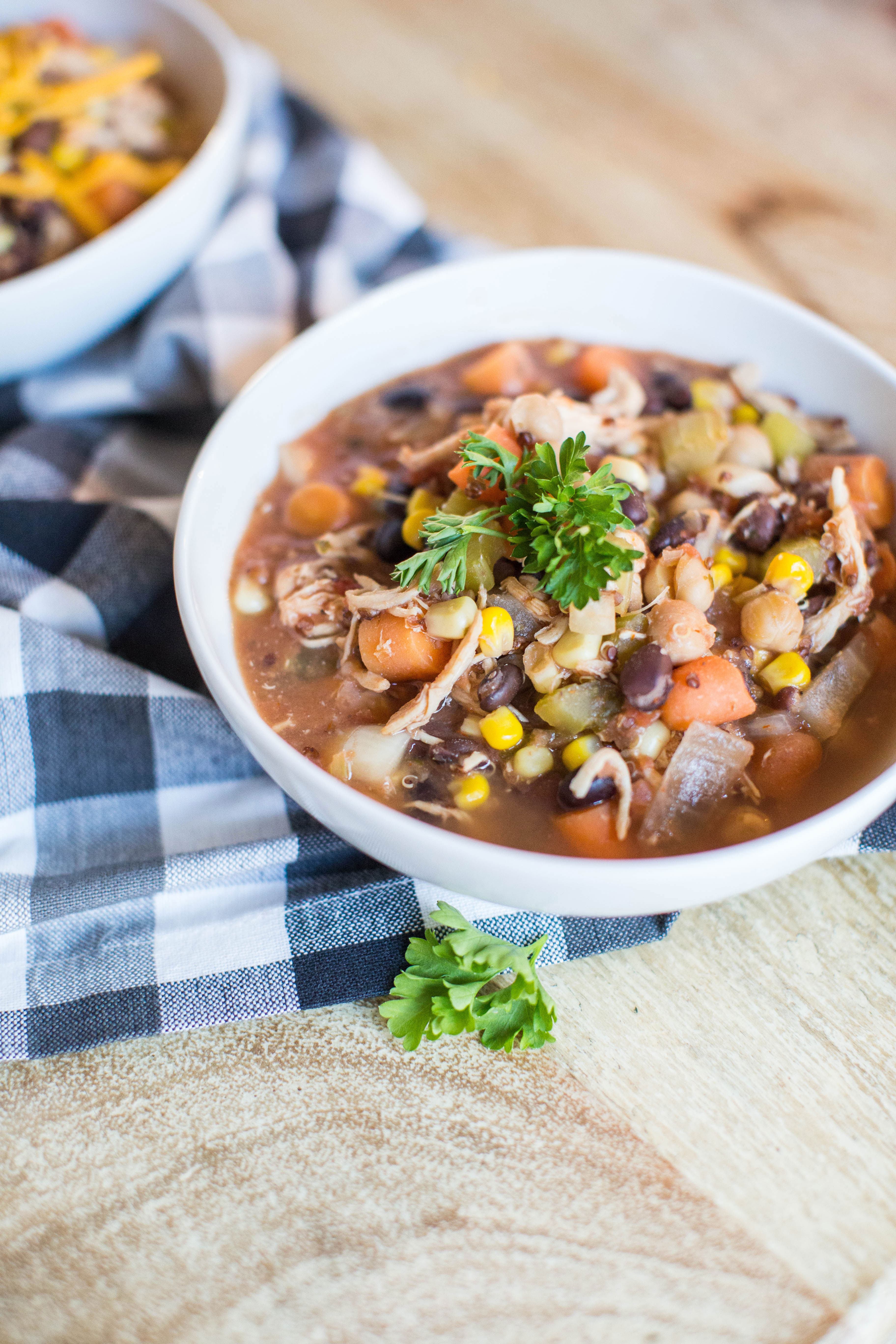 This amazing slow cooker (crockpot or instant pot) chicken vegetable and quinoa soup is healthy and hearty and requires so little work it's kind of embarrassing. Click through for the recipe. | glitterinc.com | @glitterinc