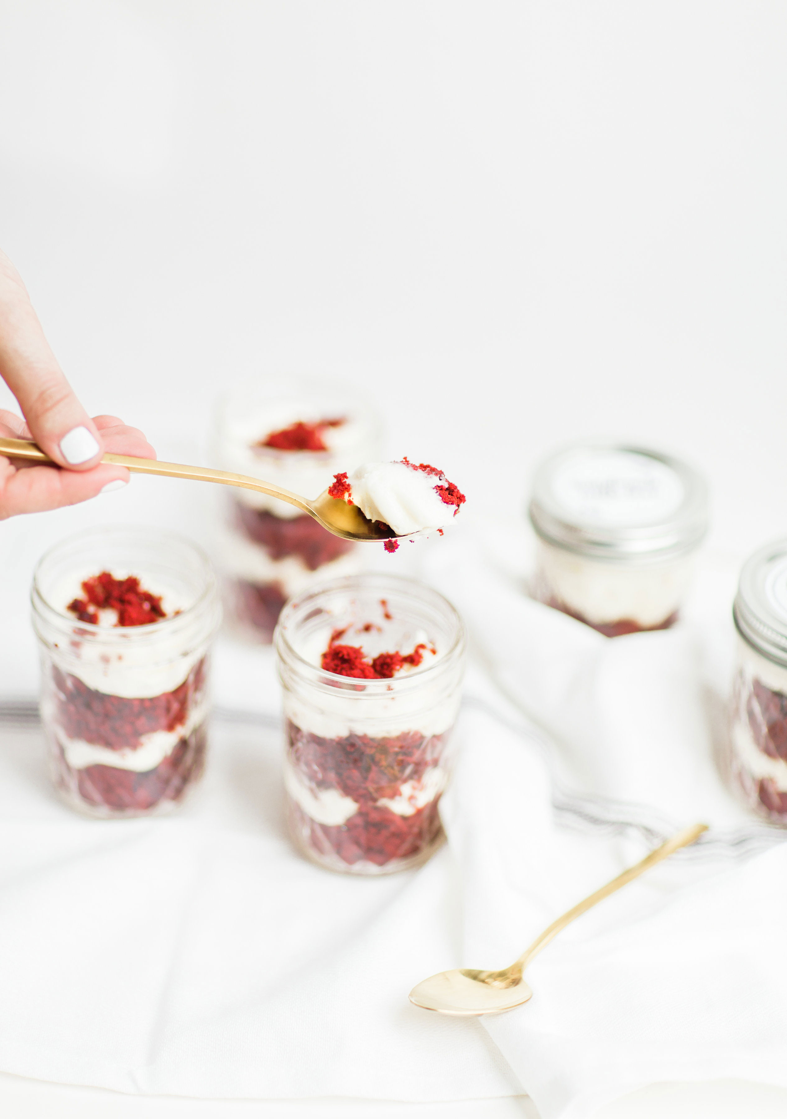 How to make my absolute FAVORITE moist red velvet cupcakes. Put them in jars for the sweetest gift! Click through for the recipe. | glitterinc.com | @glitterinc