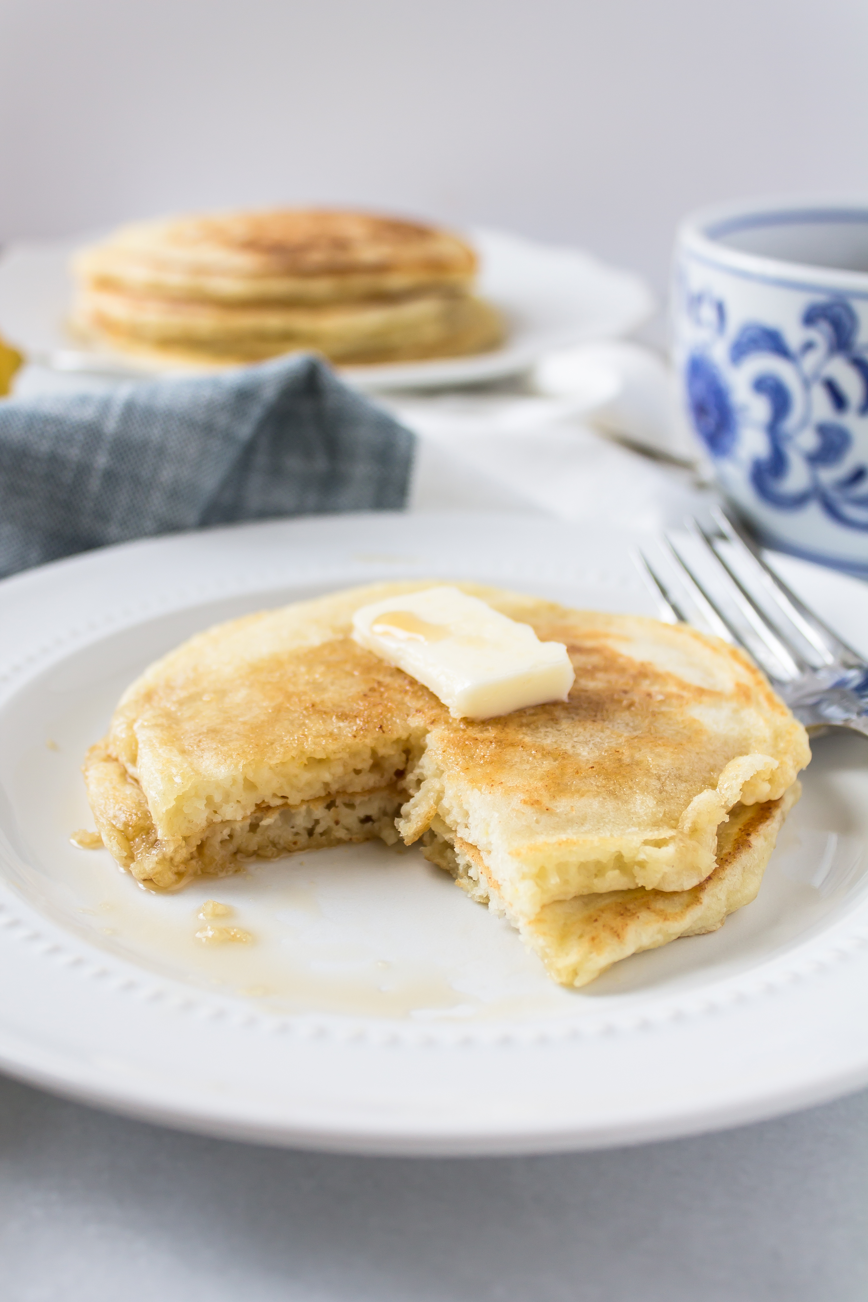 Delicious Lemon Ricotta Pancakes by foodie blogger Lexi of Glitter, Inc. Click through for the recipe. | glitterinc.com | @glitterinc