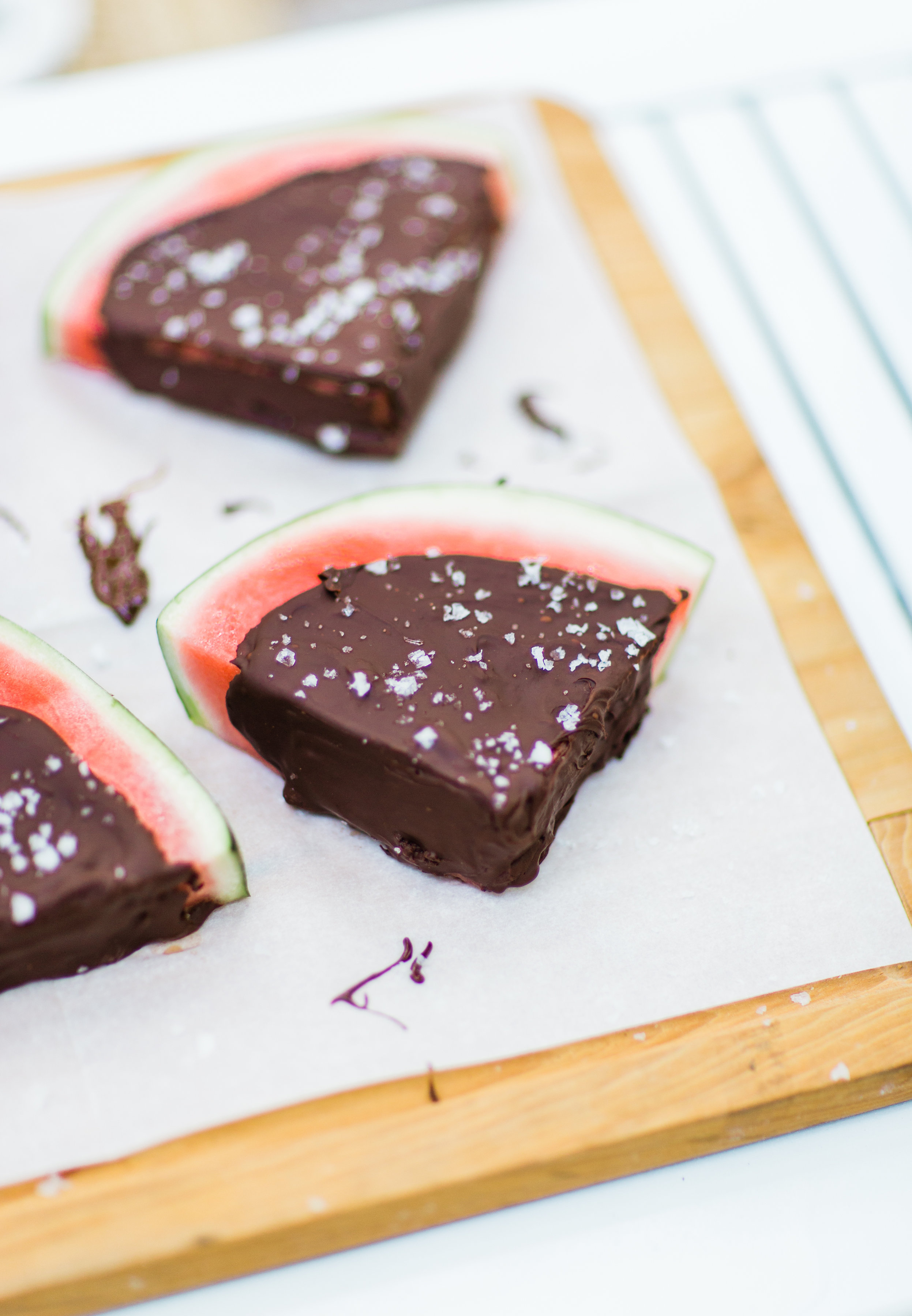 Salted Dark Chocolate Watermelon Slices by lifestyle blogger Lexi of Glitter, Inc. Click through for the perfect summer recipe. | glitterinc.com | @glitterinc