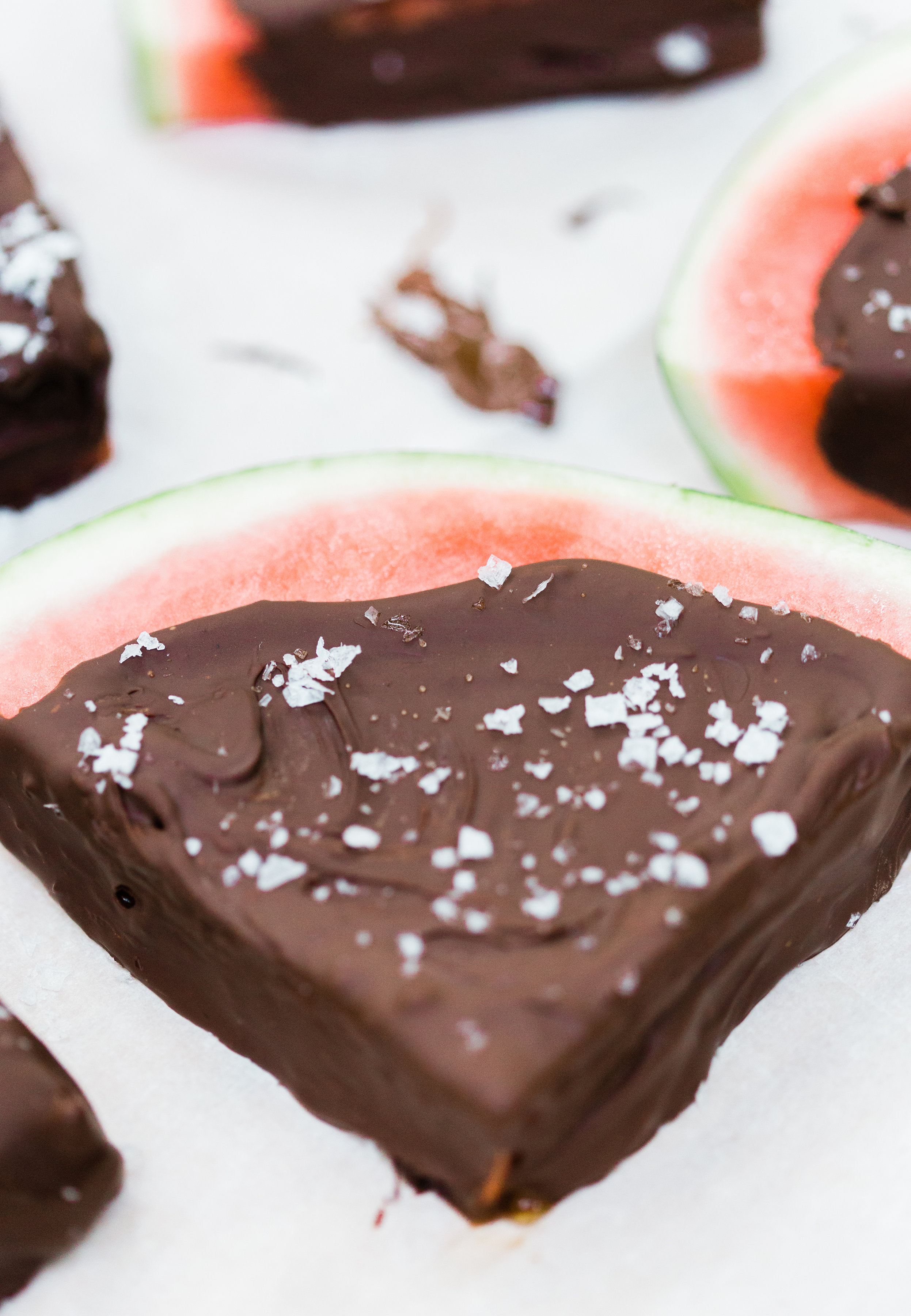 Salted Dark Chocolate Watermelon Slices by lifestyle blogger Lexi of Glitter, Inc. Click through for the perfect summer recipe. | glitterinc.com | @glitterinc