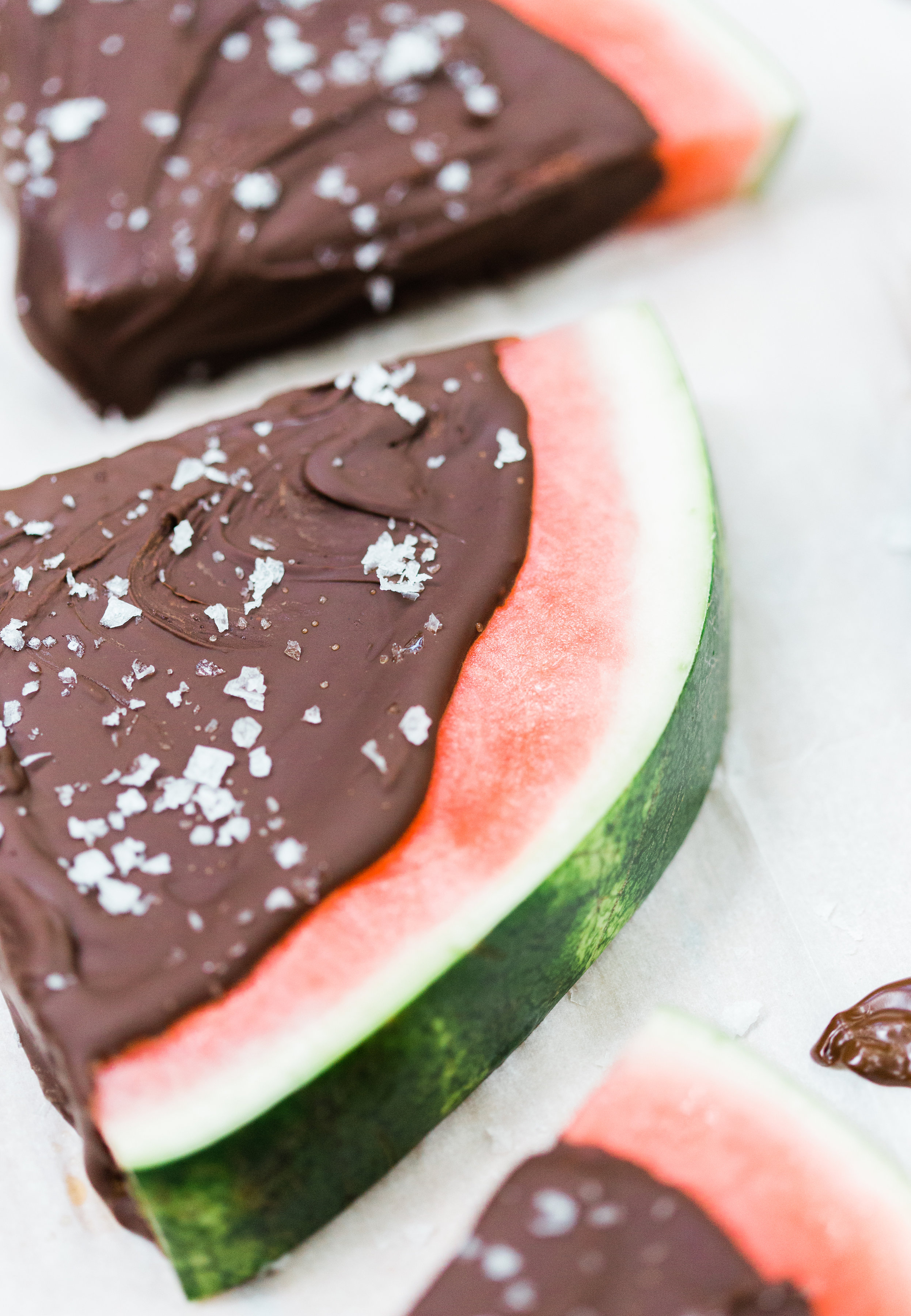 Salted Dark Chocolate Watermelon Slices by lifestyle blogger Lexi of Glitter, Inc. Click through for the perfect summer recipe. | glitterinc.com | @glitterinc