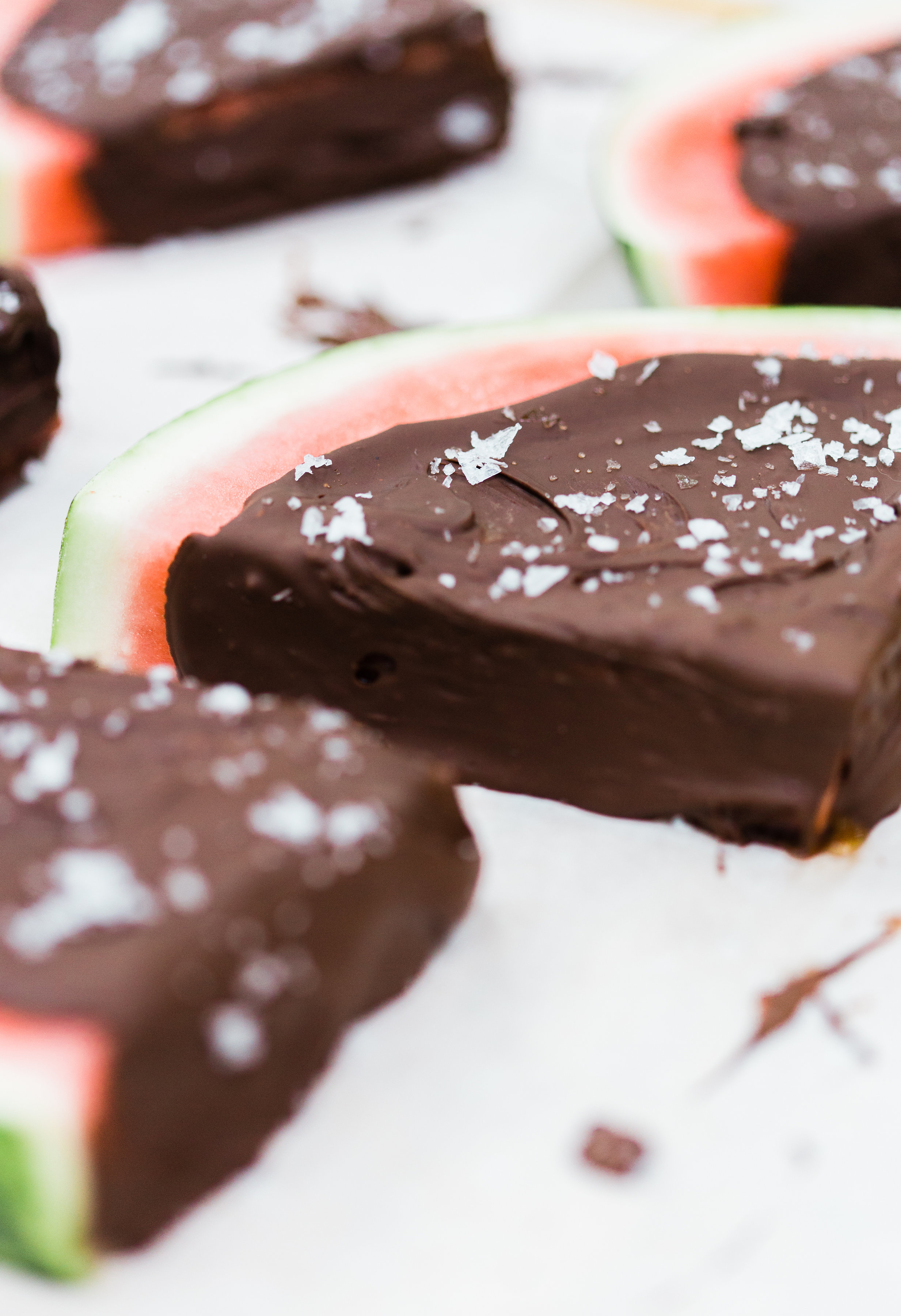 Salted Dark Chocolate Watermelon Slices by lifestyle blogger Lexi of Glitter, Inc. Click through for the perfect summer recipe. | glitterinc.com | @glitterinc