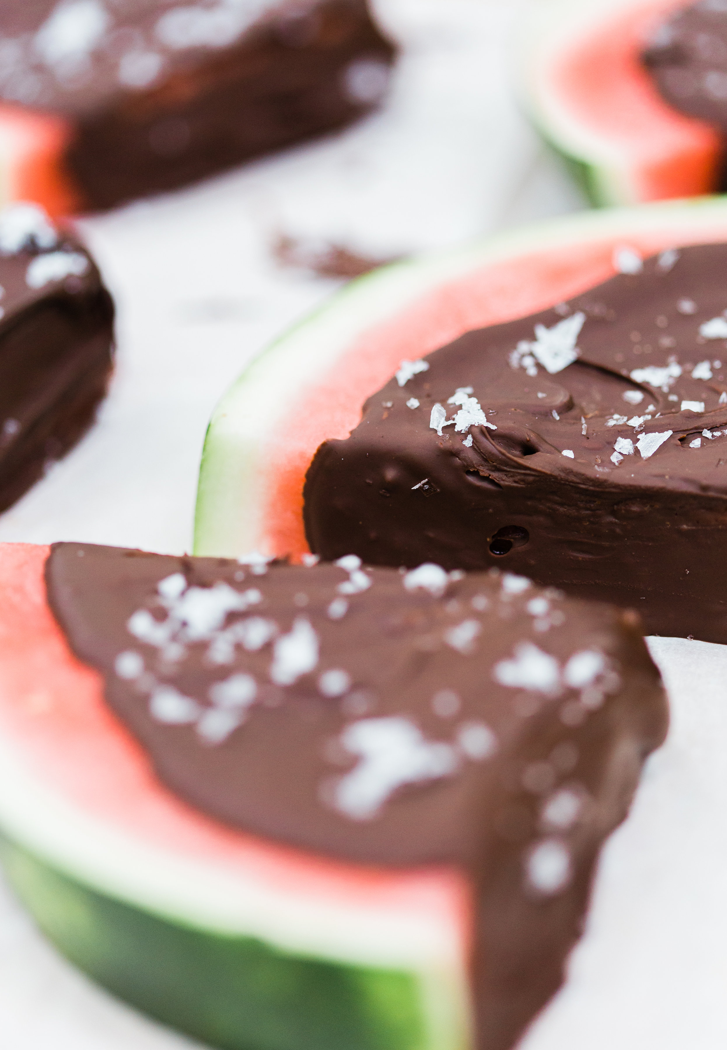 Salted Dark Chocolate Watermelon Slices by lifestyle blogger Lexi of Glitter, Inc. Click through for the perfect summer recipe. | glitterinc.com | @glitterinc