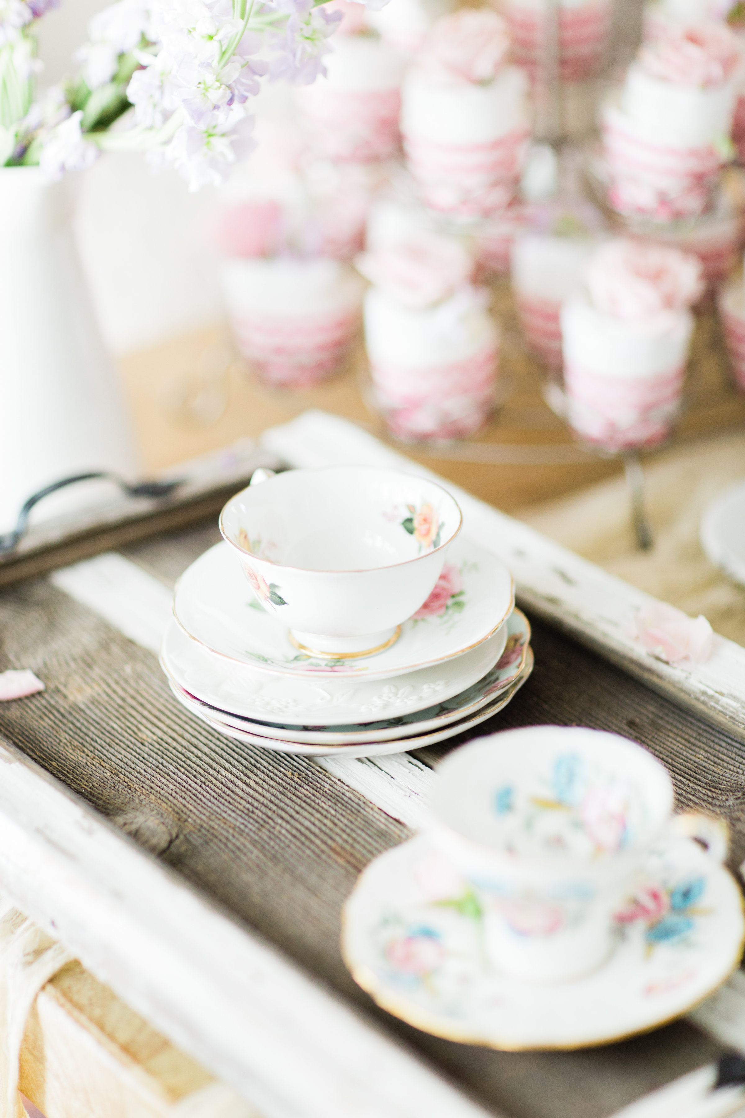 Lifestyle blogger Lexi of Glitter, Inc. shares how to throw a tea party baby shower in 6 easy steps; plus a DIY diaper cake using cupcake liners! #babyshower #teaparty #teapartybabyshower #shower #teapartyshower #party #newbaby #baby | Click through for the details. | glitterinc.com | @glitterinc