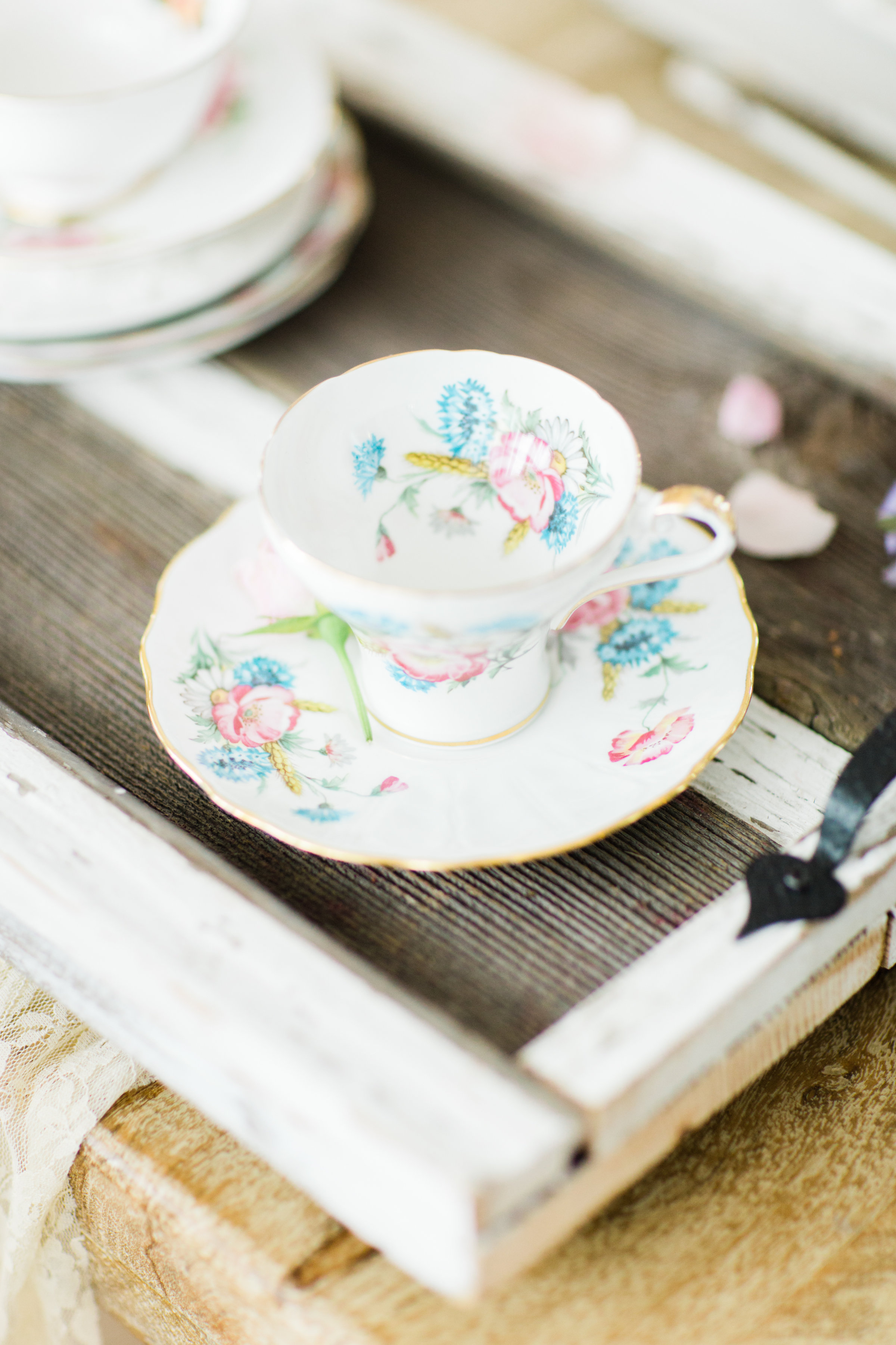 Lifestyle blogger Lexi of Glitter, Inc. shares how to throw a tea party baby shower in 6 easy steps; plus a DIY diaper cake using cupcake liners! #babyshower #teaparty #teapartybabyshower #shower #teapartyshower #party #newbaby #baby | Click through for the details. | glitterinc.com | @glitterinc