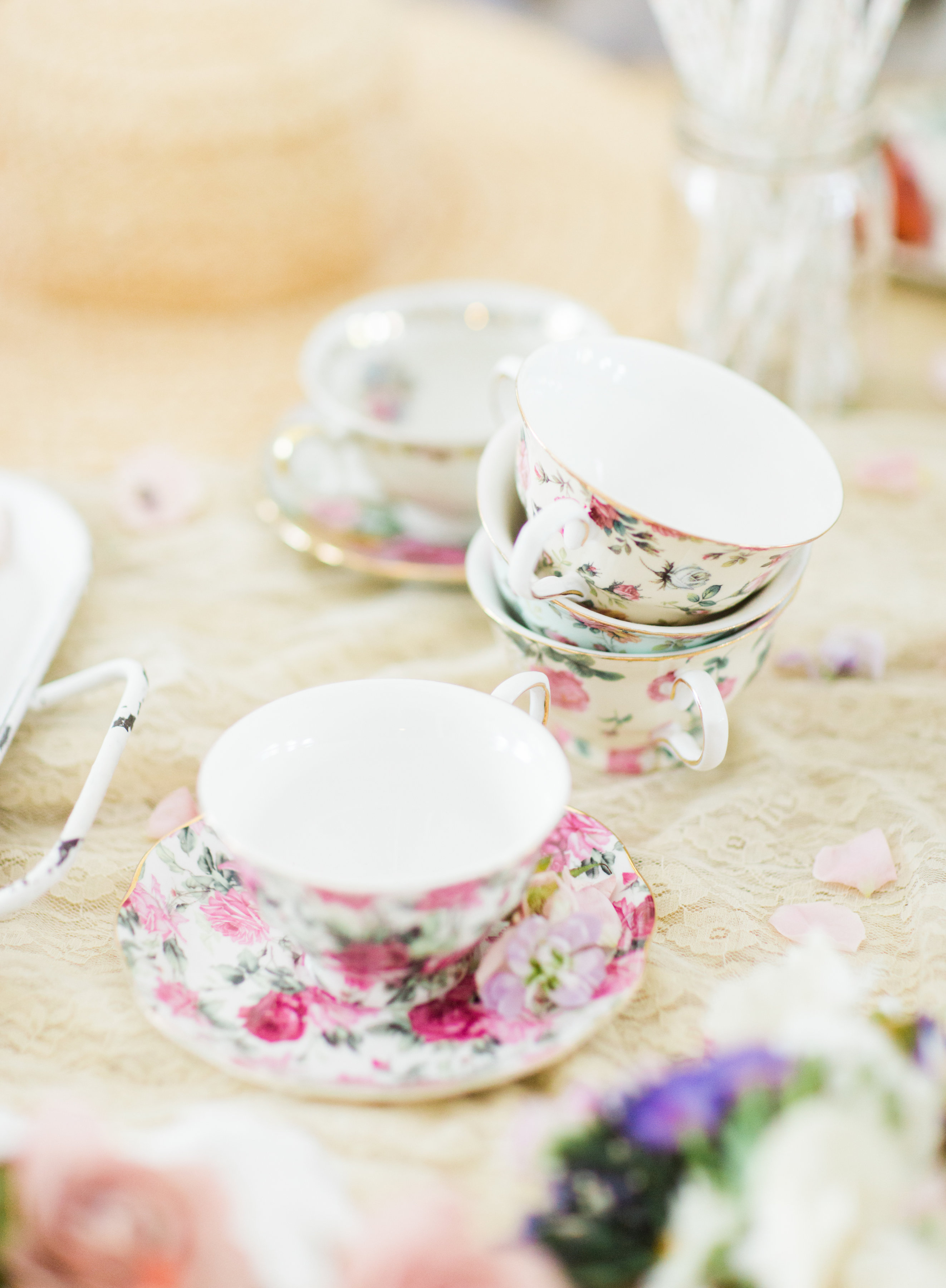 Lifestyle blogger Lexi of Glitter, Inc. shares how to throw a tea party baby shower in 6 easy steps; plus a DIY diaper cake using cupcake liners! #babyshower #teaparty #teapartybabyshower #shower #teapartyshower #party #newbaby #baby | Click through for the details. | glitterinc.com | @glitterinc