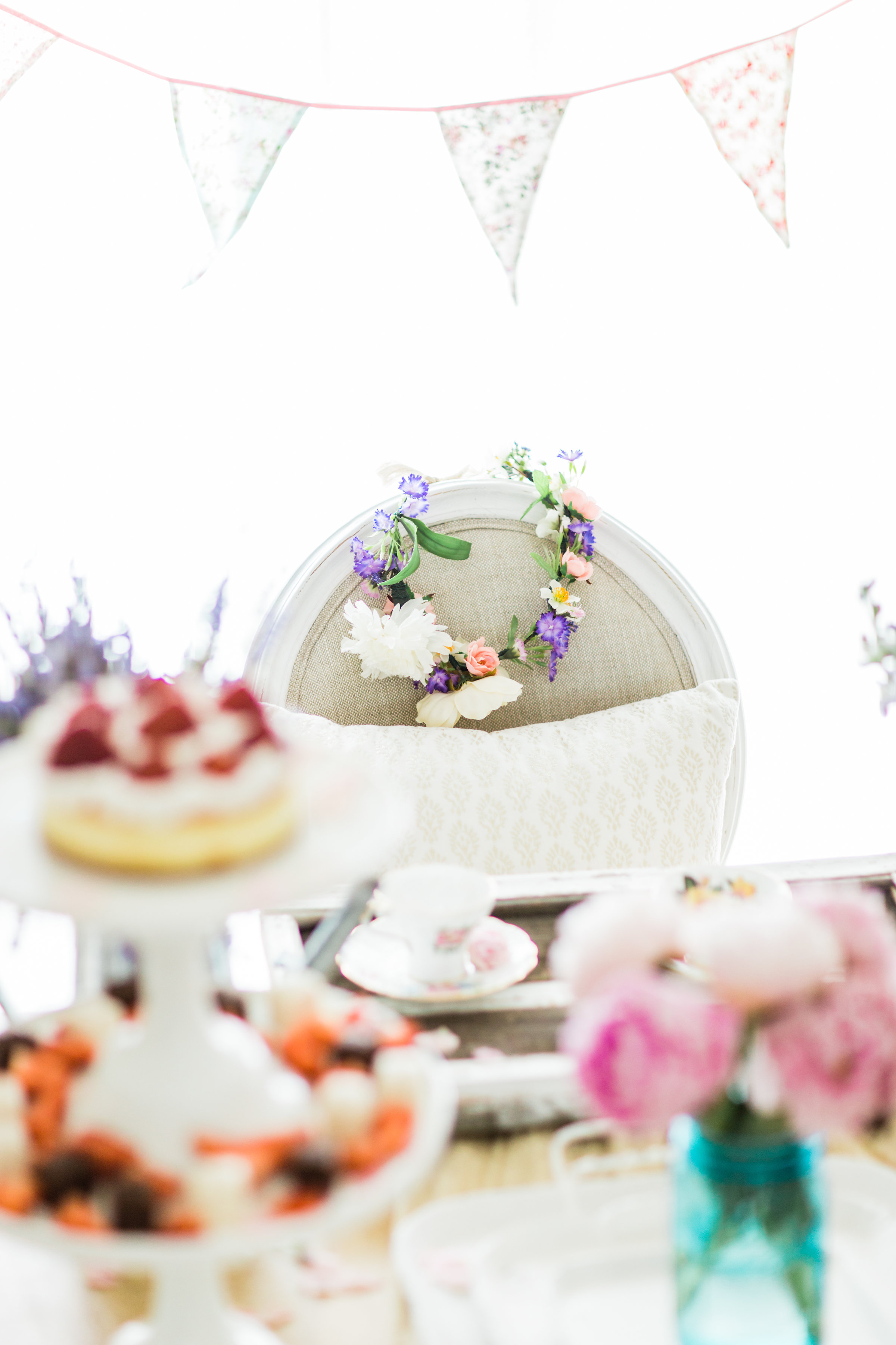 Lifestyle blogger Lexi of Glitter, Inc. shares how to throw a tea party baby shower in 6 easy steps; plus a DIY diaper cake using cupcake liners! #babyshower #teaparty #teapartybabyshower #shower #teapartyshower #party #newbaby #baby | Click through for the details. | glitterinc.com | @glitterinc