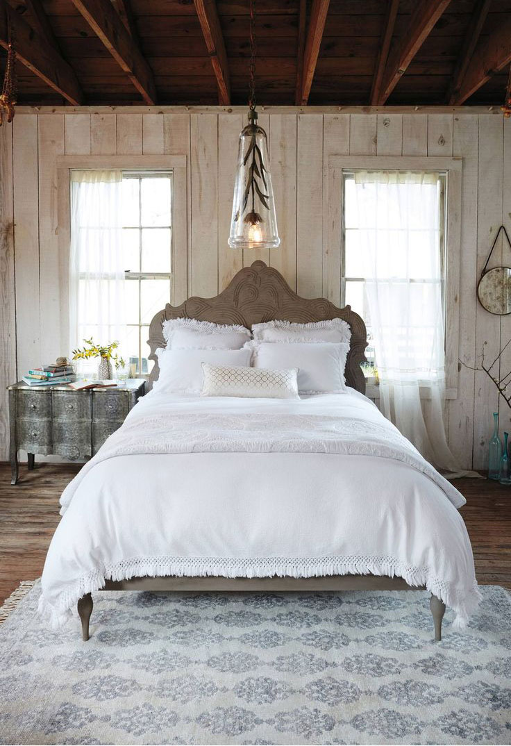 Lifestyle blogger Lexi of Glitter, Inc. rounds up 25 Must-Buy Items from Anthropologie's Summer Tag Sale. Loving this bohemian bedroom! | glitterinc.com | @glitterinc