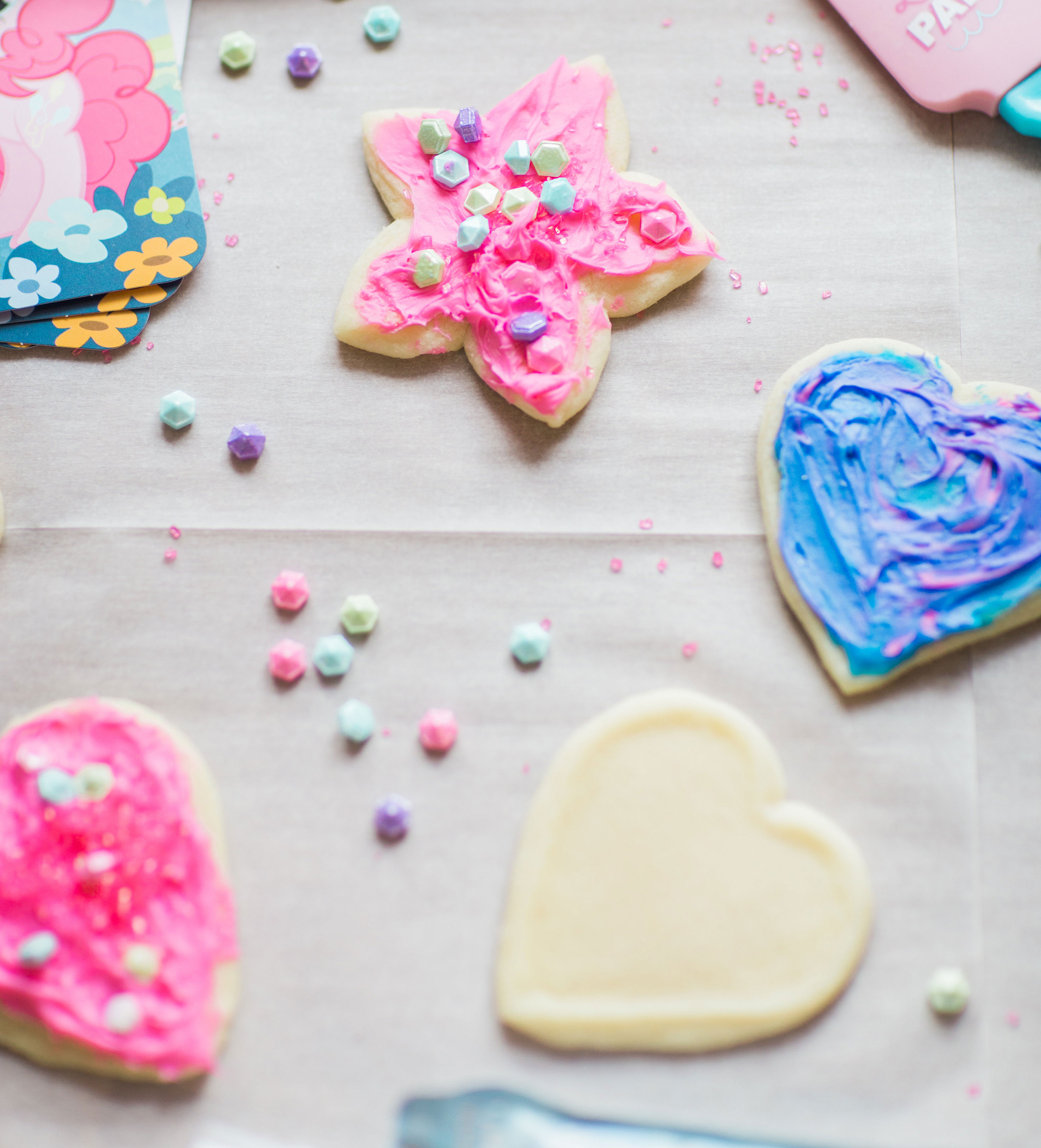 Lifestyle blogger Lexi of Glitter, Inc. shares how to throw your own My Little Pony Party: complete with a cookie decorating station. | glitterinc.com | @glitterinc