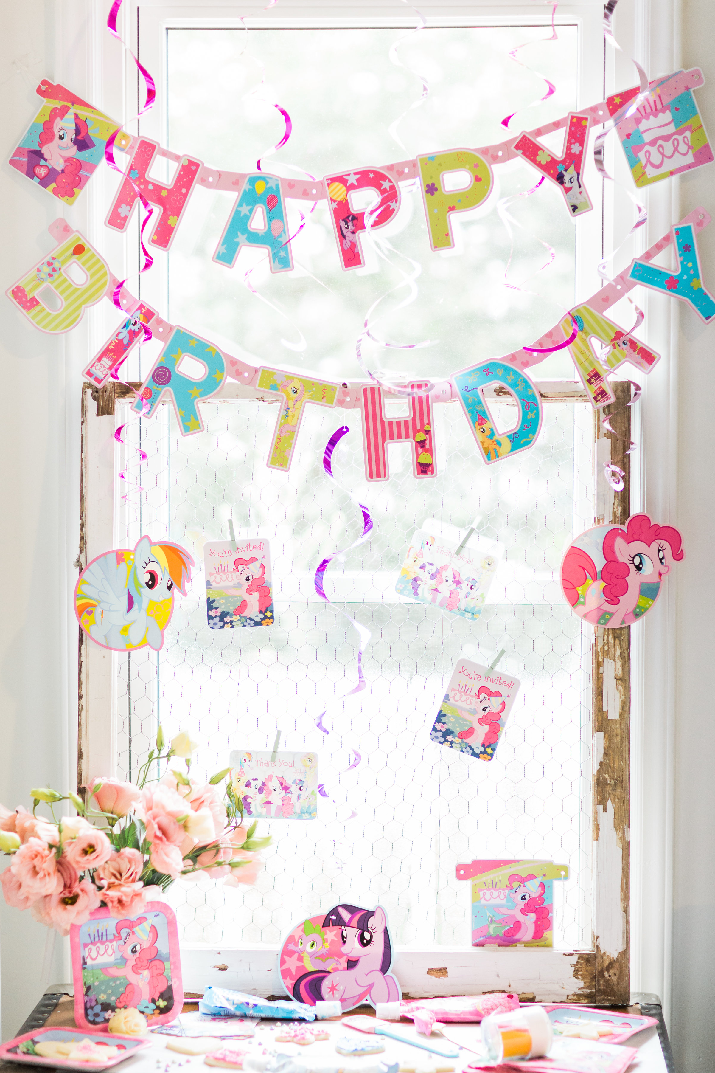 Lifestyle blogger Lexi of Glitter, Inc. shares how to throw your own My Little Pony Party: complete with a cookie decorating station. | glitterinc.com | @glitterinc