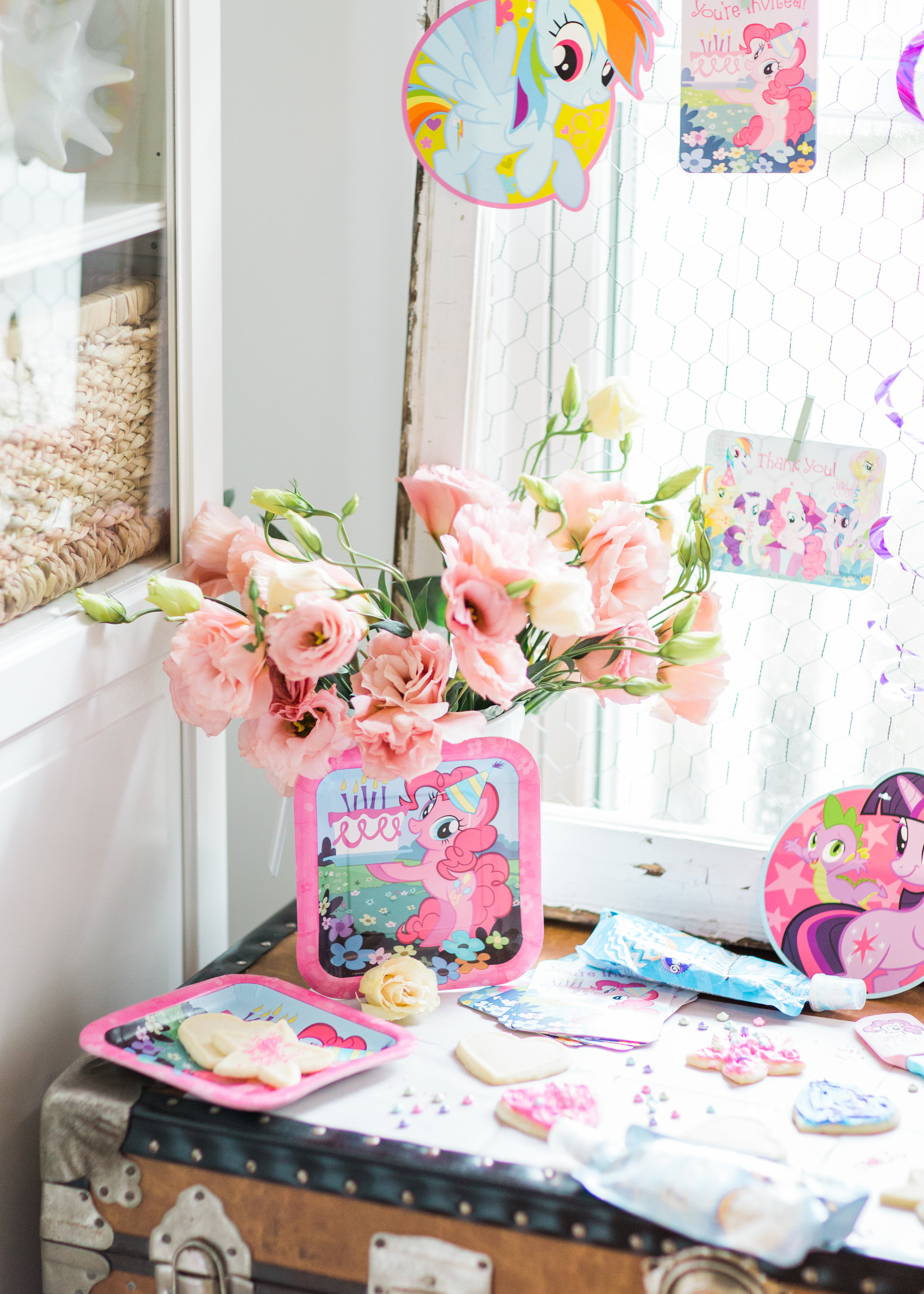 Lifestyle blogger Lexi of Glitter, Inc. shares how to throw your own My Little Pony Party: complete with a cookie decorating station. | glitterinc.com | @glitterinc