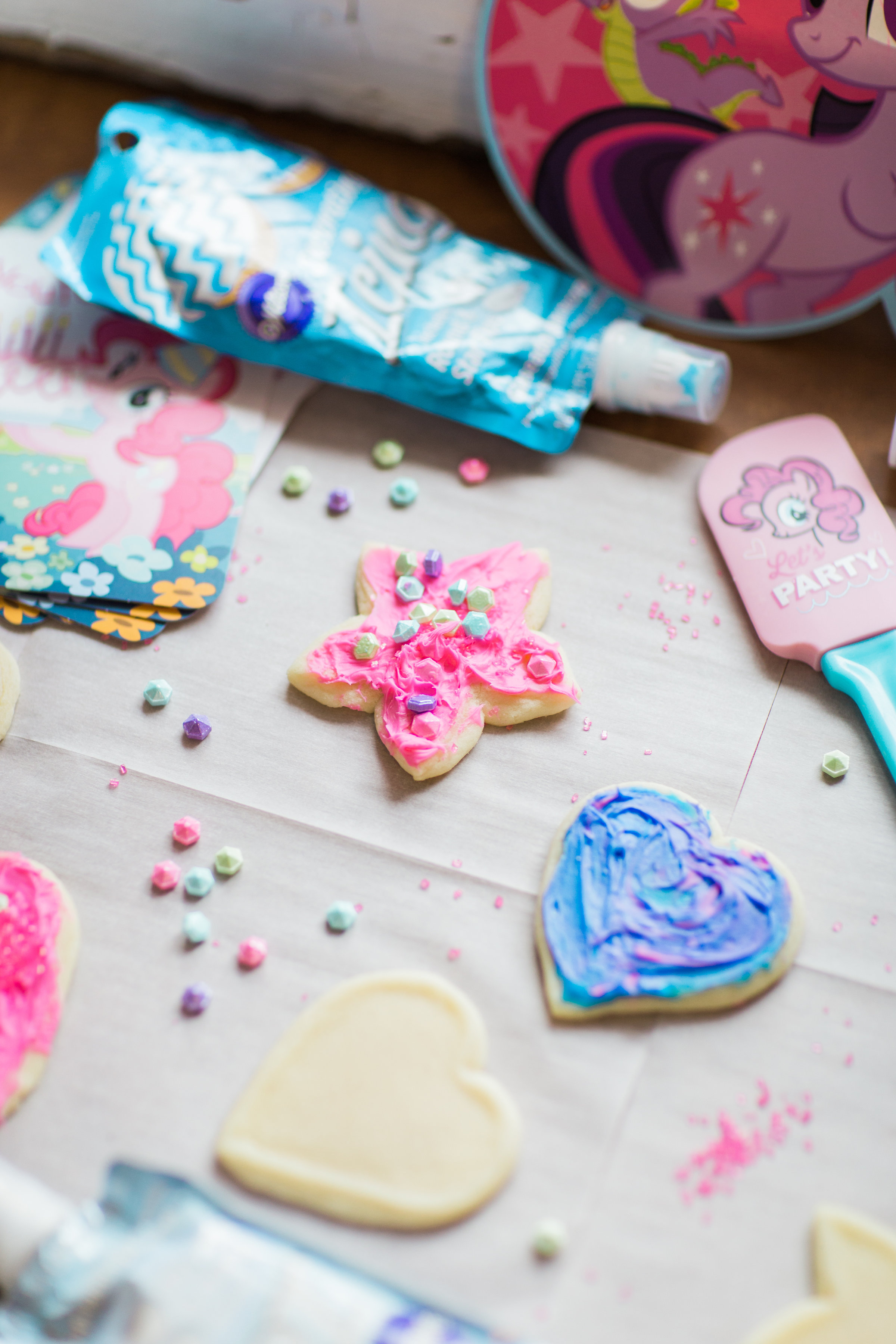 Lifestyle blogger Lexi of Glitter, Inc. shares how to throw your own My Little Pony Party: complete with a cookie decorating station. | glitterinc.com | @glitterinc