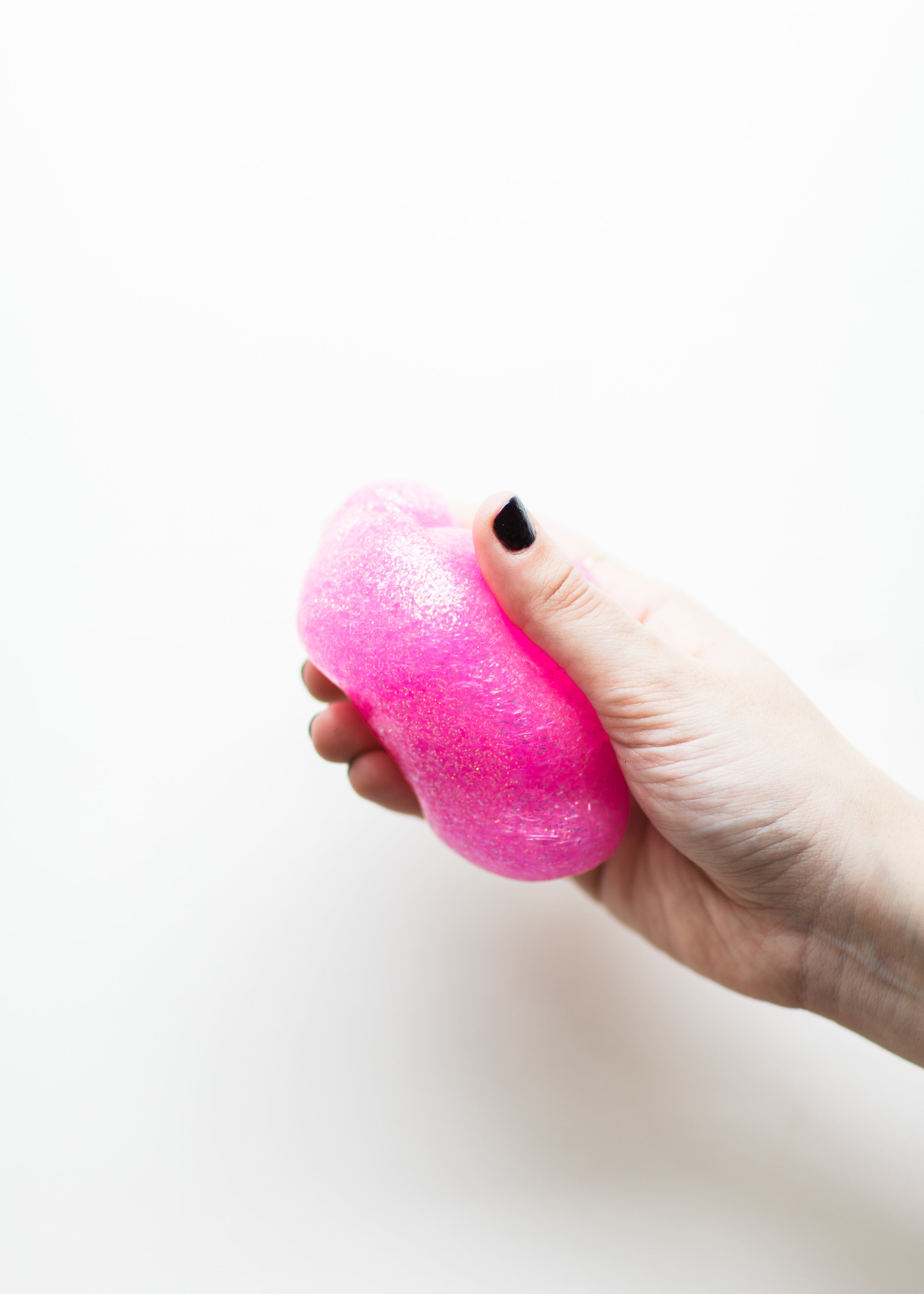 This kid-friendly slime recipe takes just 3 ingredients to make! Click through for the DIY. | glitterinc.com | @glitterinc - 3-Ingredient Pink Glitter Slime by NC lifestyle blogger Glitter, Inc.