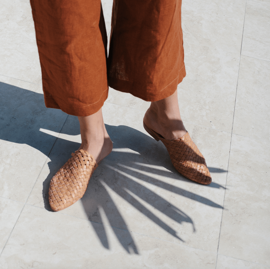 All The Cool Girls Are Wearing Them Woven Leather Mules Glitter