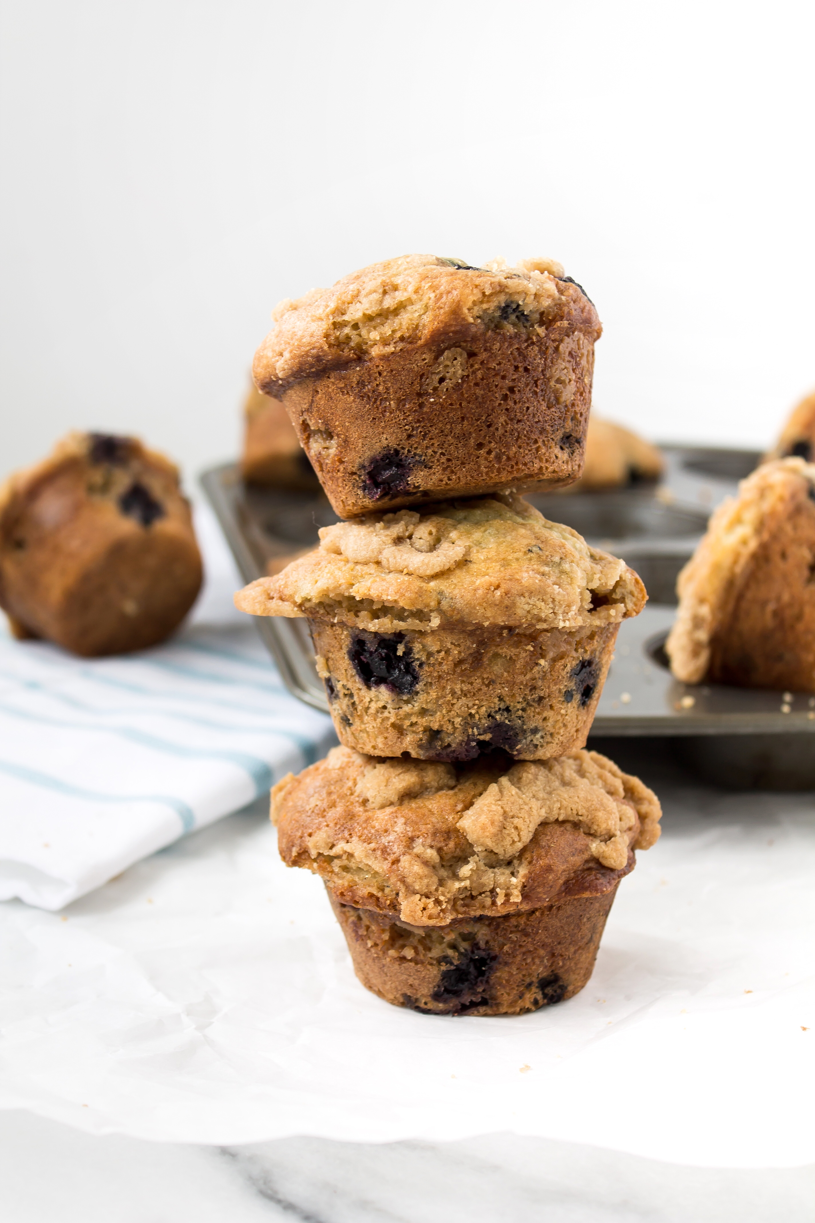 The most incredible blueberry lavender streusel muffins packed with fresh blueberries, a hint of delicate lavender, and topped with a buttery-sweet streusel. YUM. Click through for the recipe. | glitterinc.com | @glitterinc