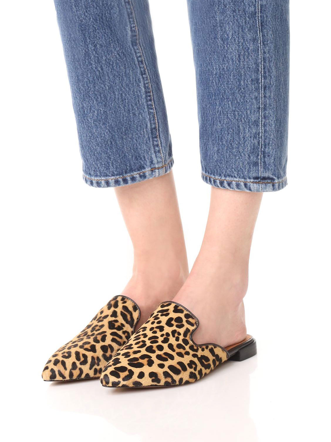 The season of stylish flats is here! Fall shoe love: Steven by Steve Madden Valent Leopard Haircalf Mules | glitterinc.com | @glitterinc - 15 Trendy Flats To Fall in Love With This Season by NC style blogger Glitter, Inc.