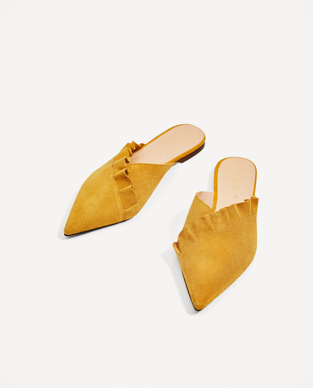 The season of stylish flats is here! Fall shoe love: Zara Leather Mules With Frill | glitterinc.com | @glitterinc