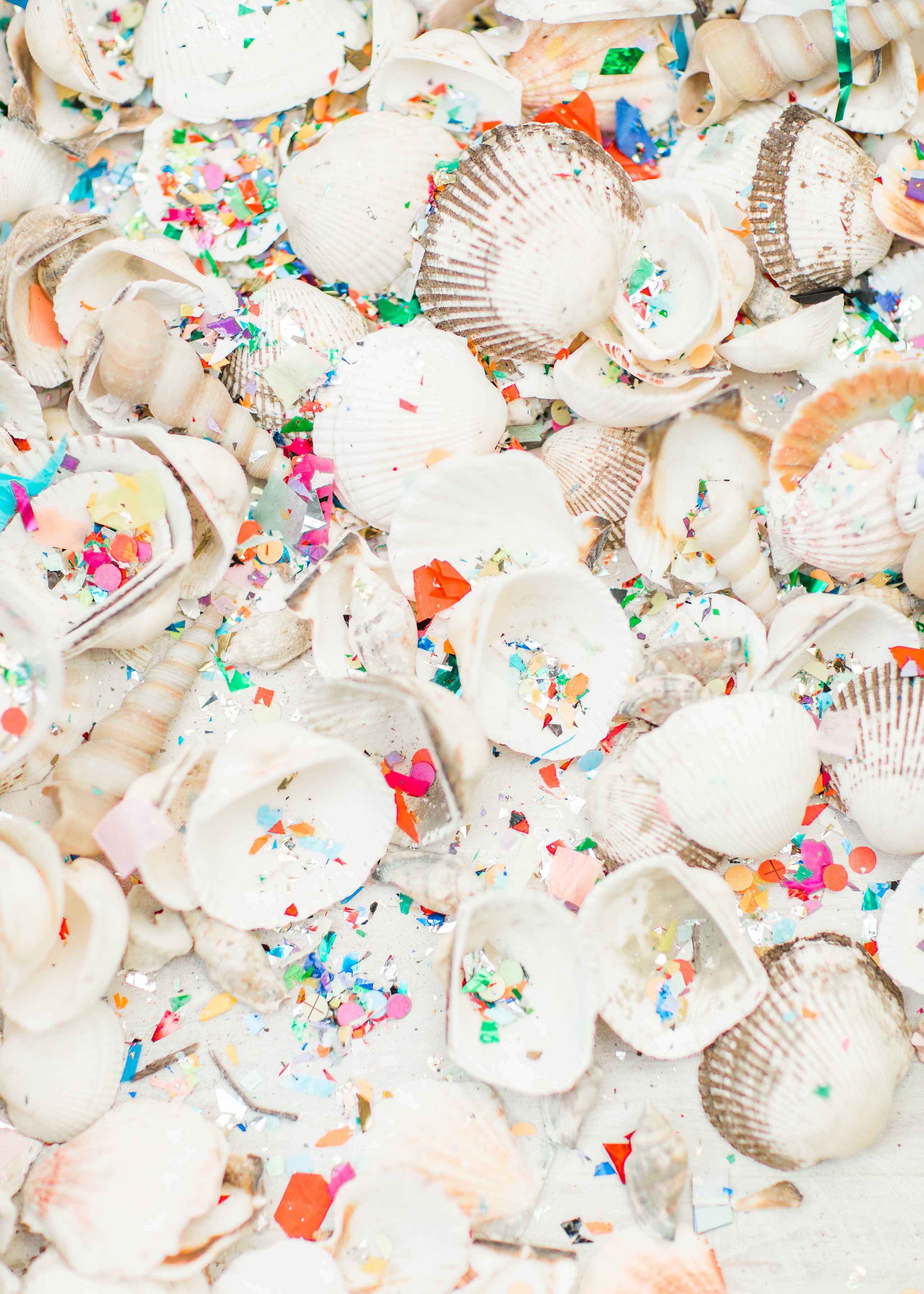 Behind-the-scenes of a magical, whimsical little girl's mermaid birthday party, complete with mermaid dessert bar, games, prizes, and crafts. Click through for the details. | glitterinc.com | @glitterinc