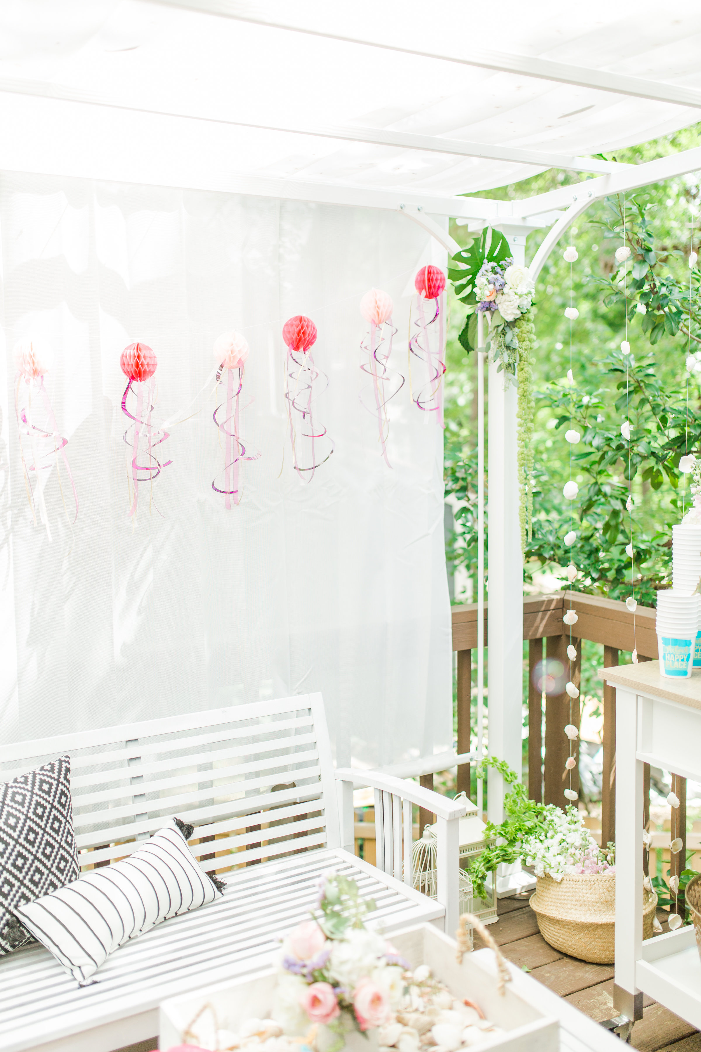 Behind-the-scenes of a magical, whimsical little girl's mermaid birthday party, complete with mermaid dessert bar, games, prizes, and crafts. Click through for the details. | glitterinc.com | @glitterinc