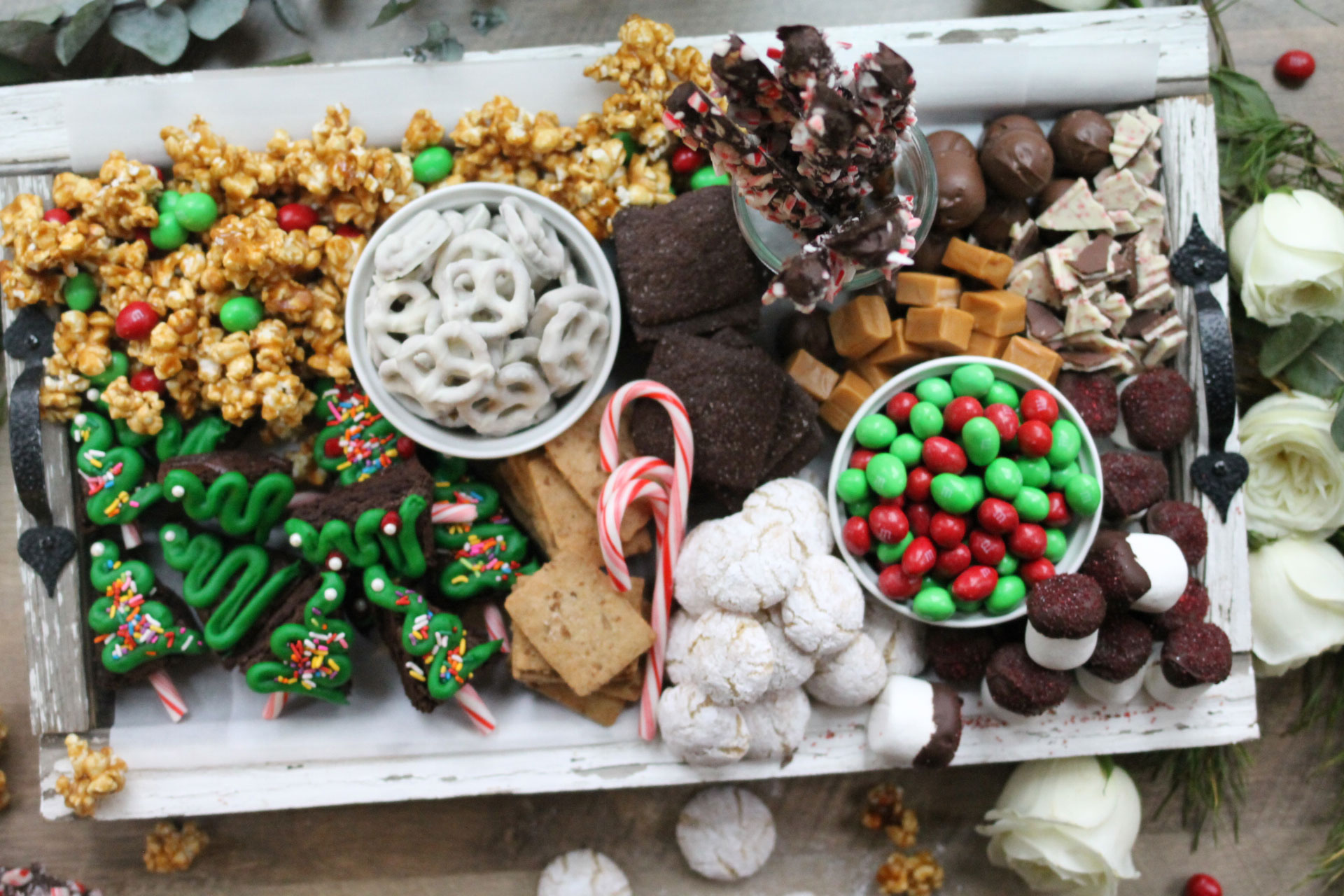 How to make the ultimate dessert snack board for the holidays; a.k.a., a sweet charcuterie spread. | glitterinc.com | @glitterinc