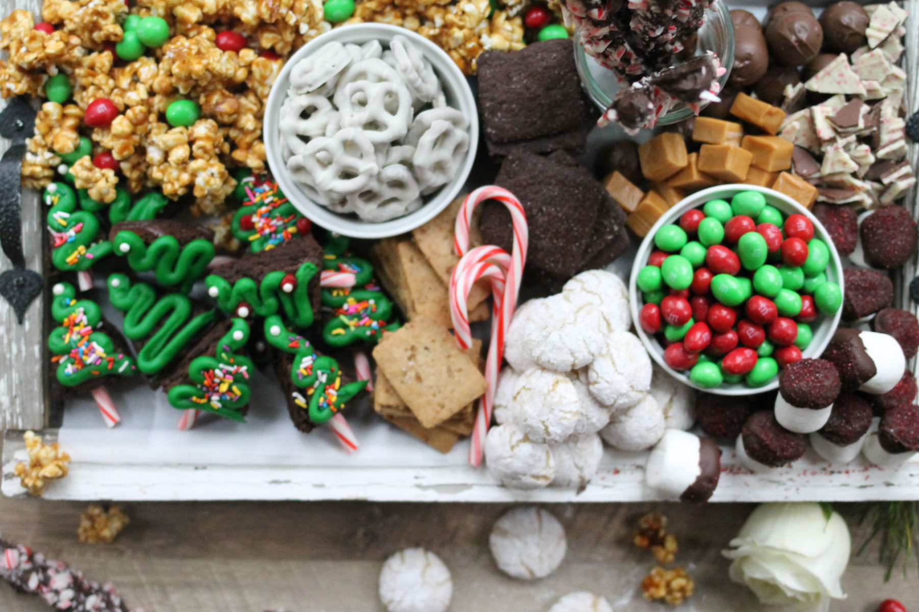 How to make the ultimate dessert snack board for the holidays; a.k.a., a sweet charcuterie spread. | glitterinc.com | @glitterinc - How to Make a Holiday Dessert Charcuterie Board by North Carolina foodie blogger Glitter, Inc.