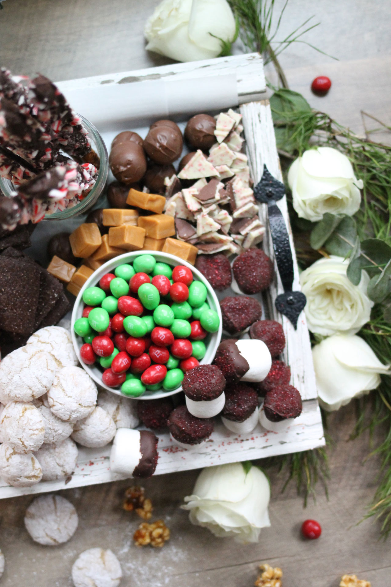 How to make the ultimate dessert snack board for the holidays; a.k.a., a sweet charcuterie spread. | glitterinc.com | @glitterinc - How to Make a Holiday Dessert Charcuterie Board by North Carolina foodie blogger Glitter, Inc.