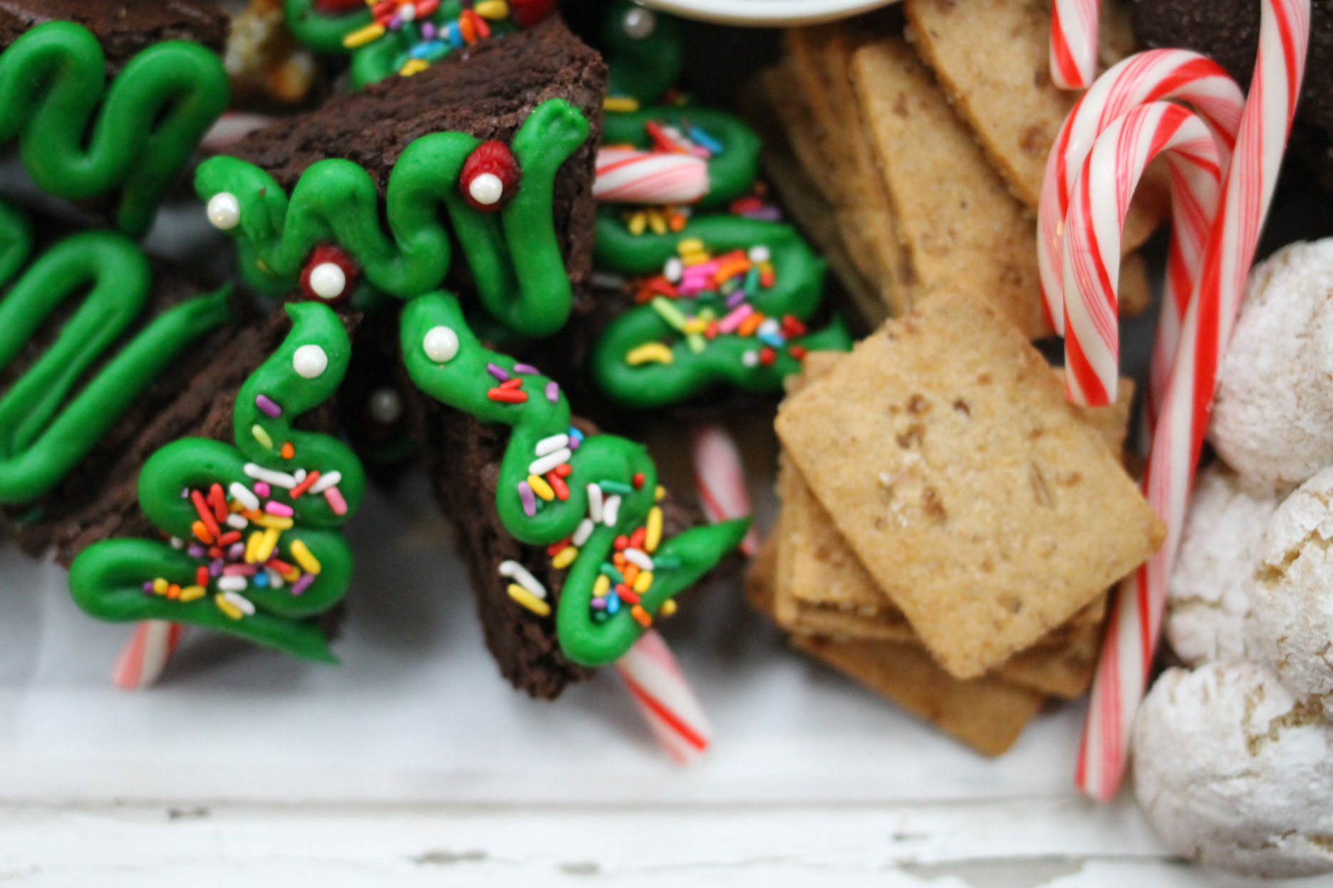 How to make the ultimate dessert snack board for the holidays; a.k.a., a sweet charcuterie spread. | glitterinc.com | @glitterinc - How to Make a Holiday Dessert Charcuterie Board by North Carolina foodie blogger Glitter, Inc.