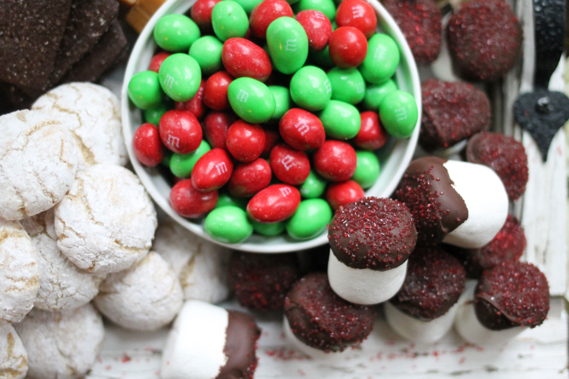 How to make the ultimate dessert snack board for the holidays; a.k.a., a sweet charcuterie spread. | glitterinc.com | @glitterinc